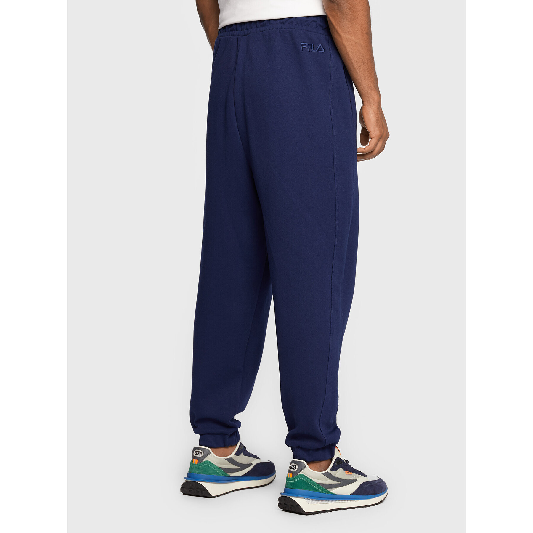 Fila Pantaloni trening Tricase FAM0153 Bleumarin Oversize - Pled.ro