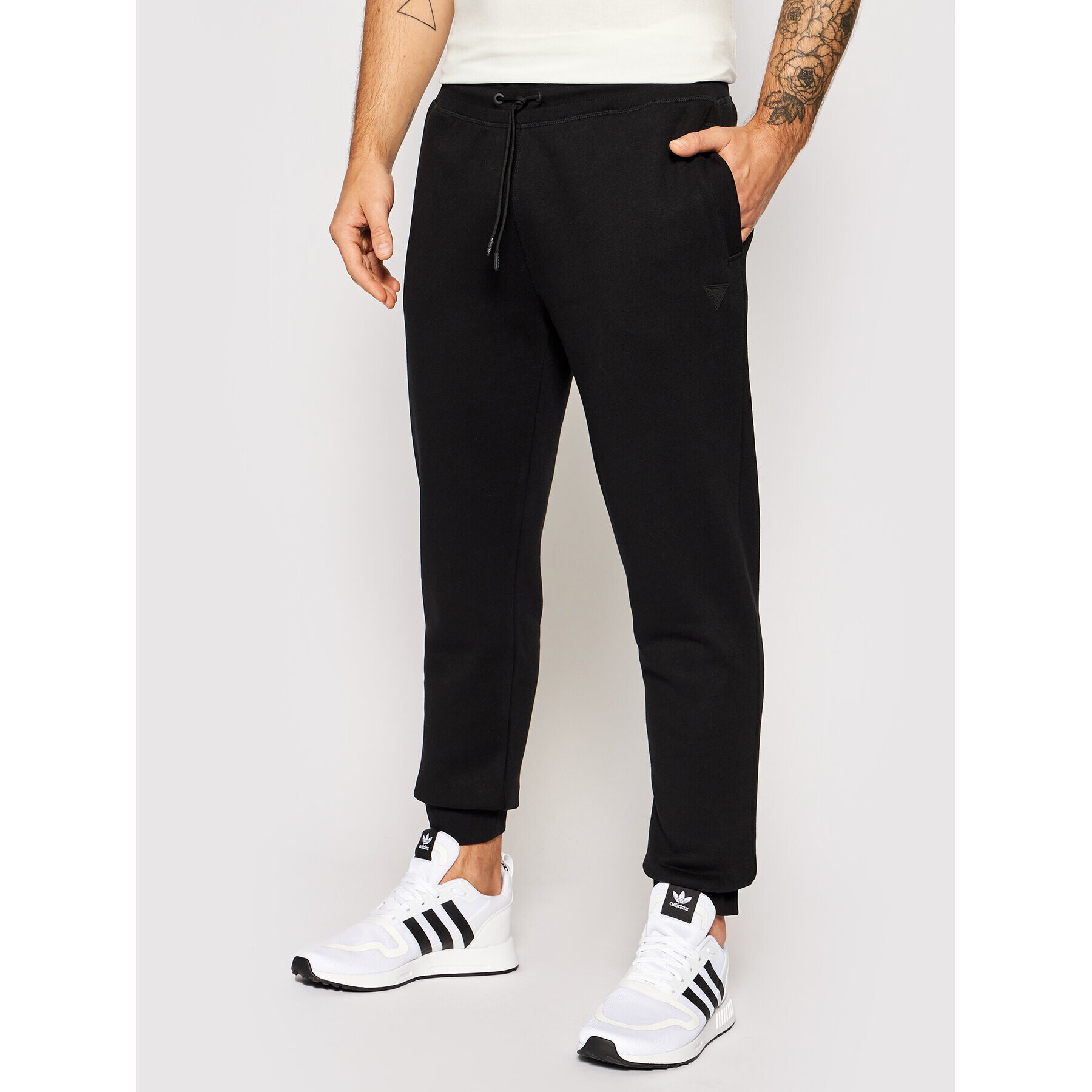 Guess Pantaloni trening U1YA04 K9V31 Negru Regular Fit - Pled.ro