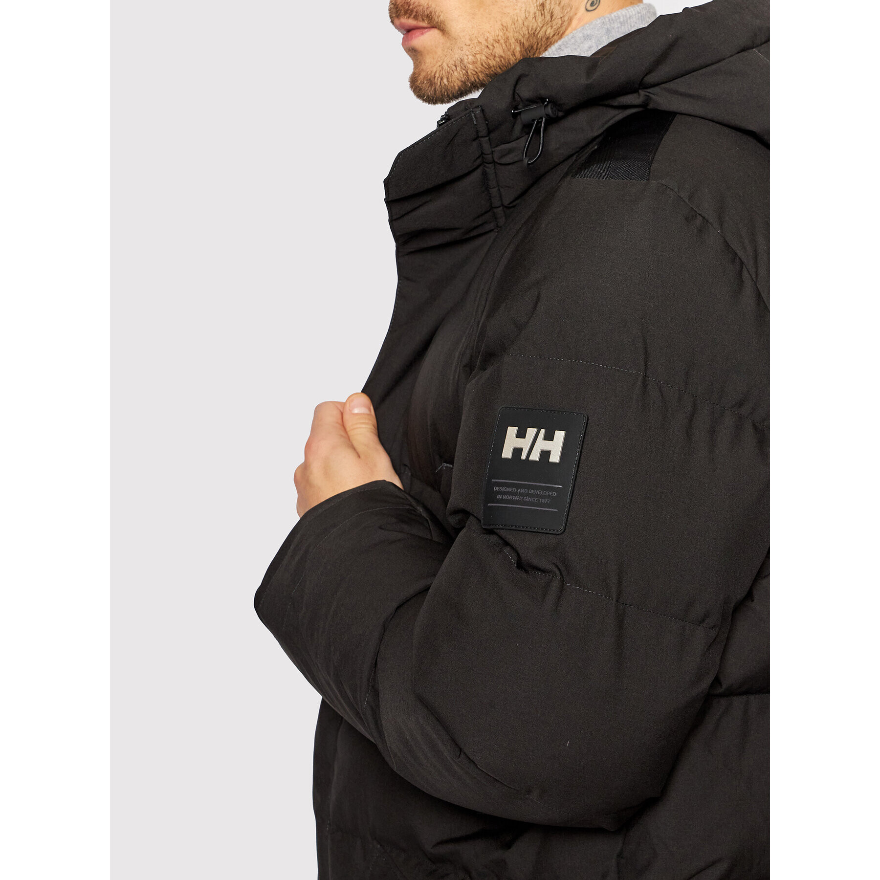 Helly Hansen Geacă din puf Alaska 53487 Negru Regular Fit - Pled.ro