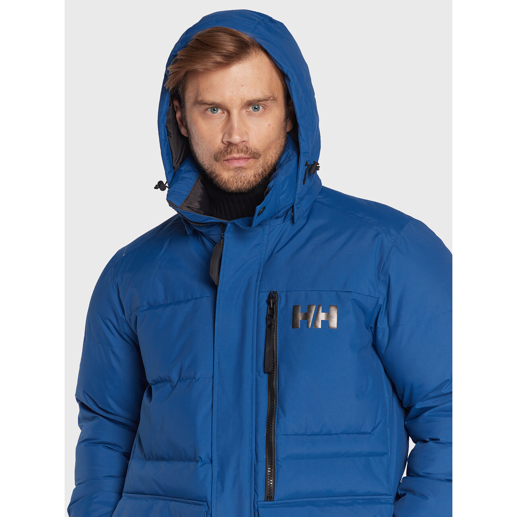 Helly Hansen Geacă din puf Tromsoe 53074 Bleumarin Regular Fit - Pled.ro