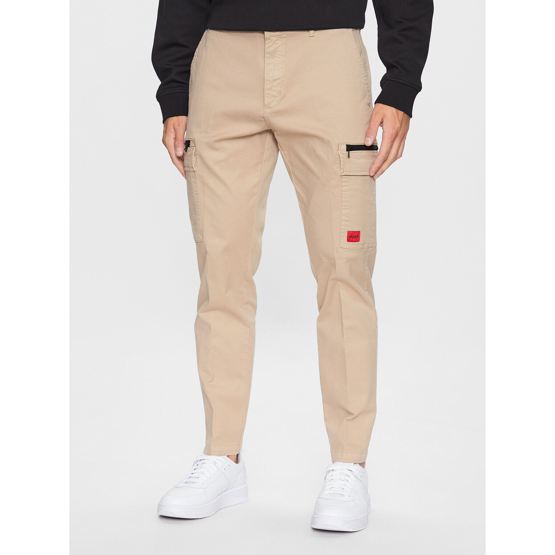 Hugo Pantaloni din material 50484022 Bej Slim Fit - Pled.ro