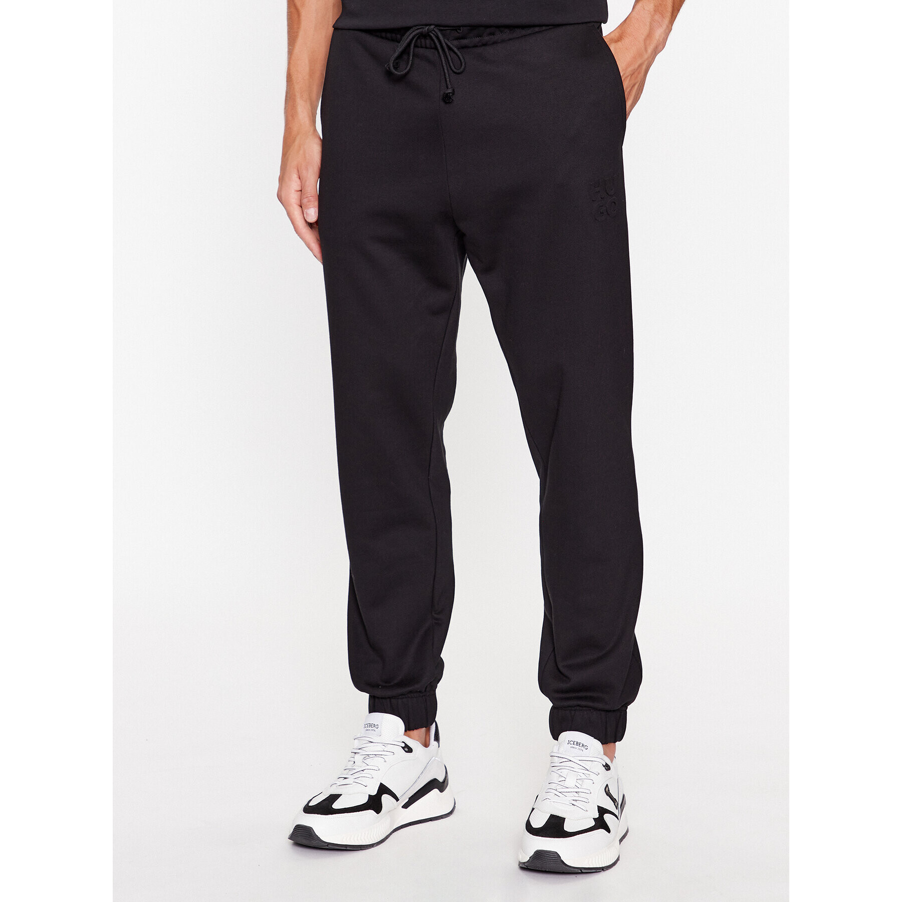 Hugo Pantaloni trening Dchard 50496652 Negru Relaxed Fit - Pled.ro