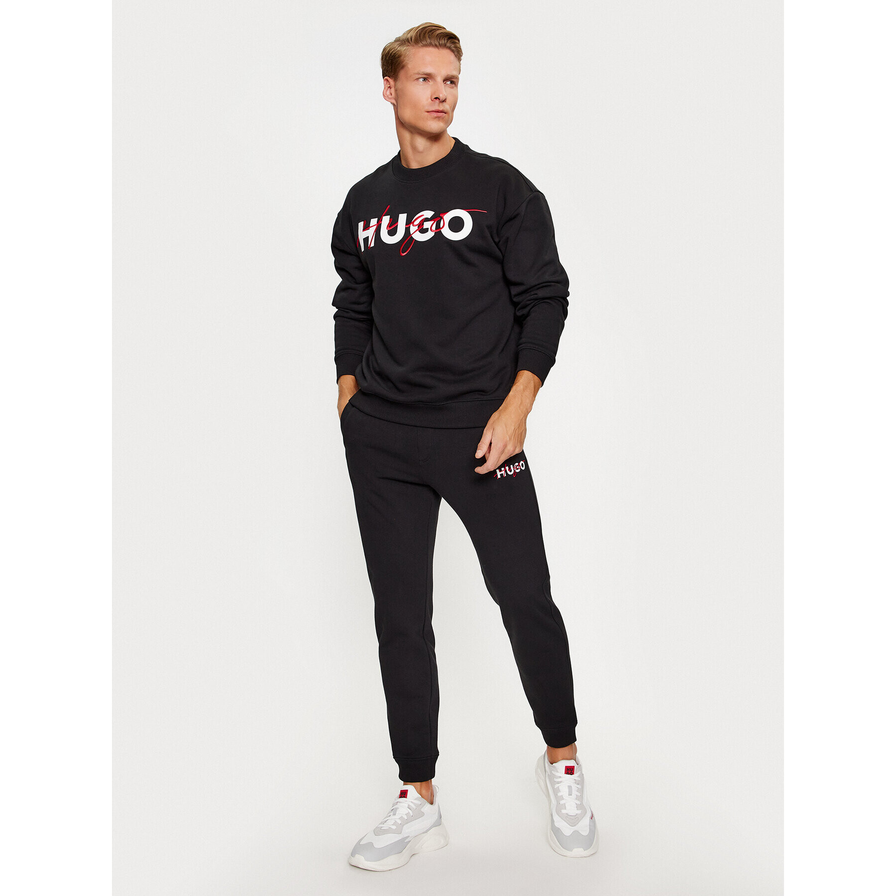 Hugo Pantaloni trening Drokko 50494571 Negru Relaxed Fit - Pled.ro