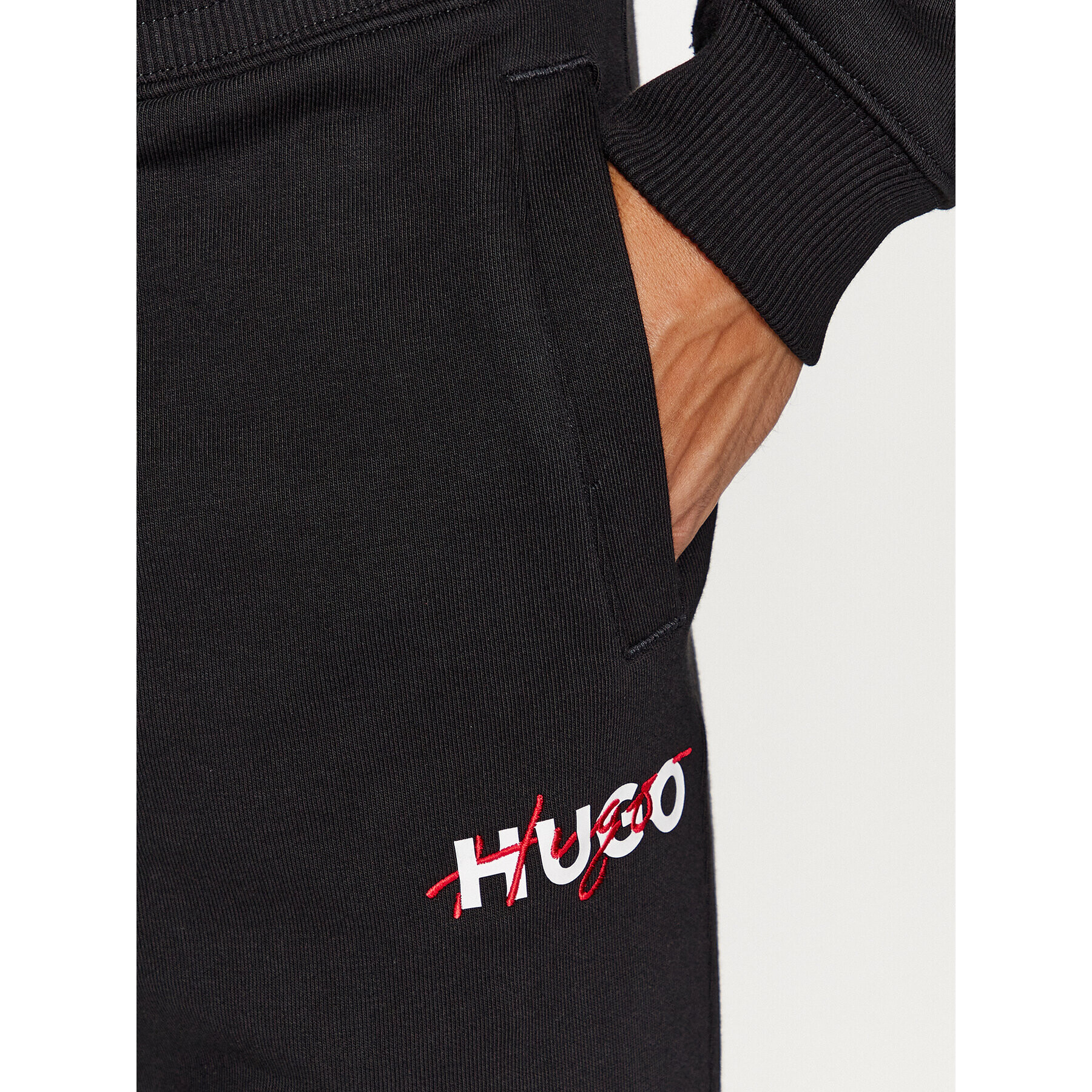 Hugo Pantaloni trening Drokko 50494571 Negru Relaxed Fit - Pled.ro