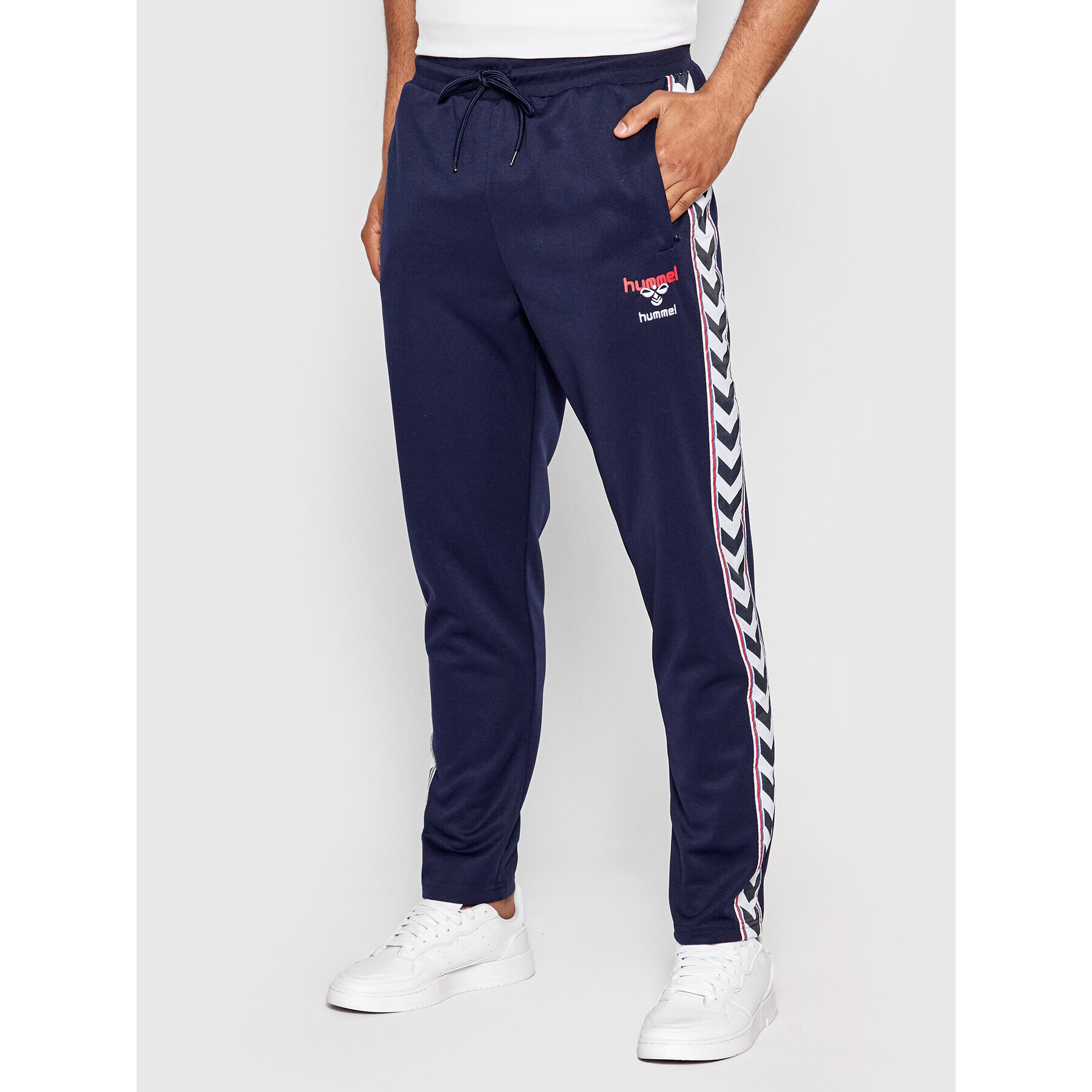 Hummel Pantaloni trening Unisex Lerby Poly 214310 Bleumarin Tapered Fit - Pled.ro