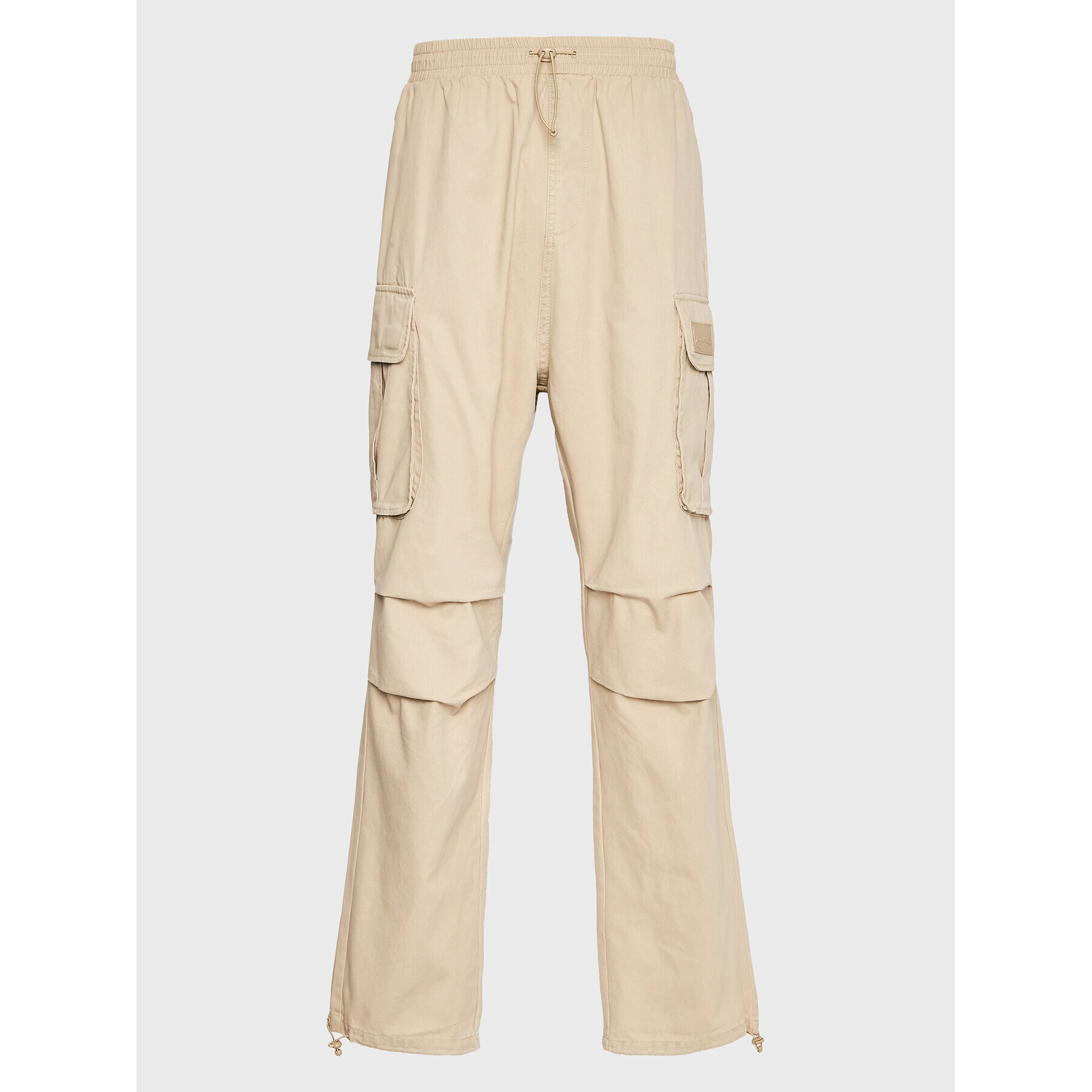 Karl Kani Pantaloni din material Rubber Signature 6002506 Bej Relaxed Fit - Pled.ro