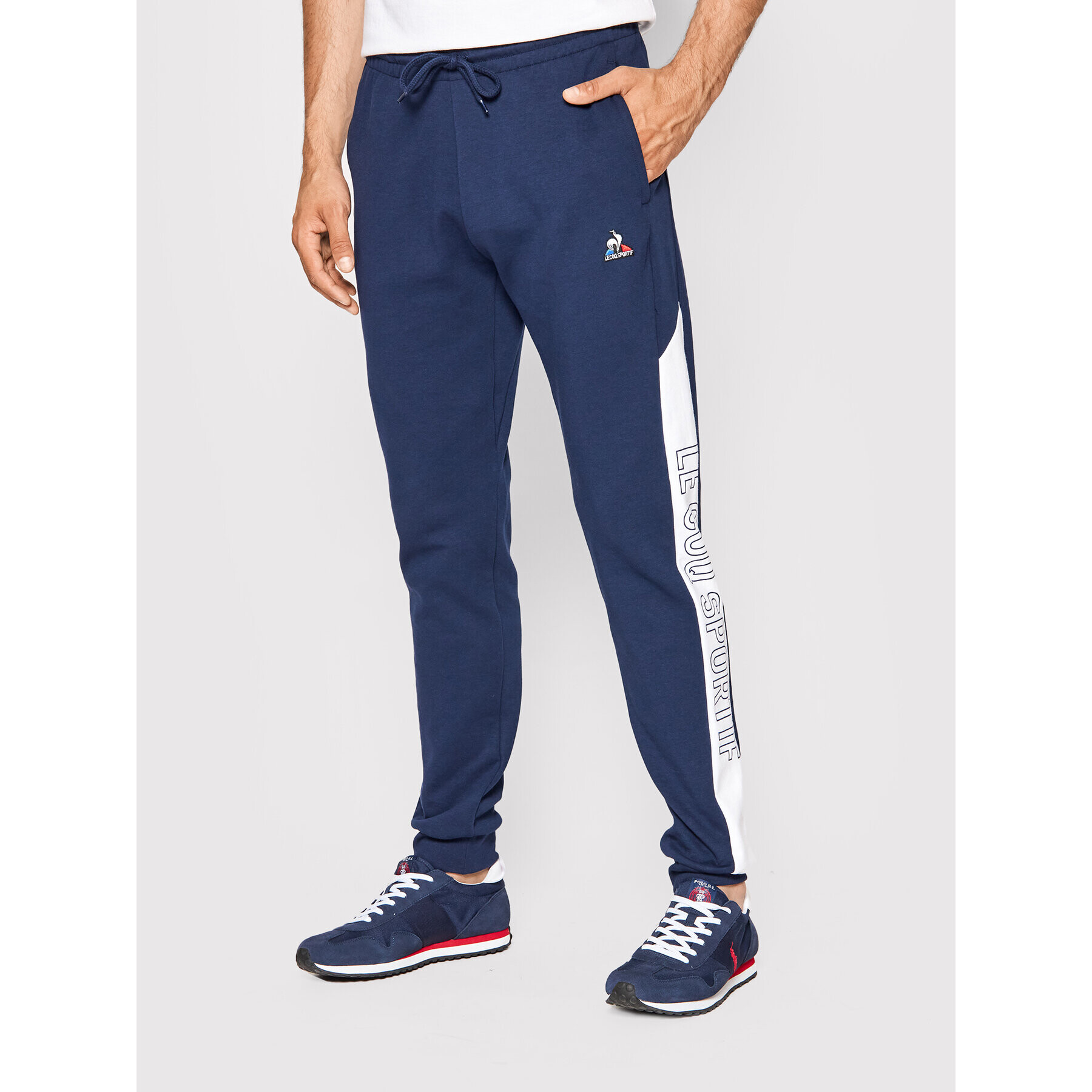 Le Coq Sportif Pantaloni trening 2210531 Bleumarin Regular Fit - Pled.ro