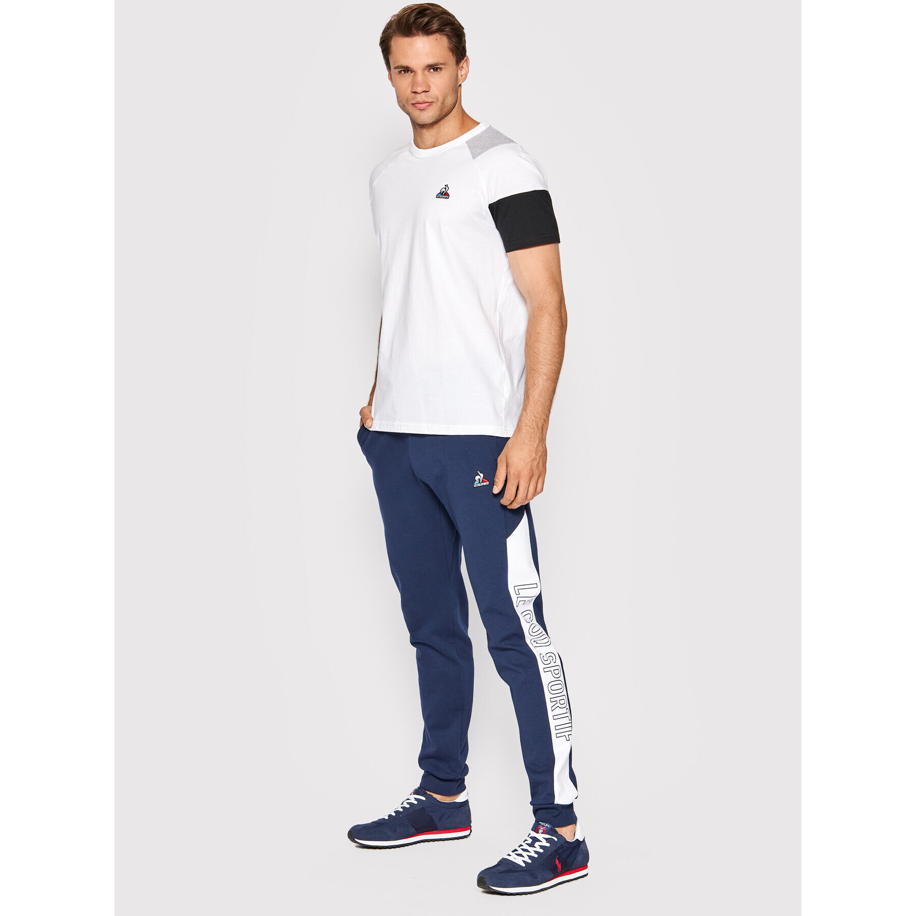 Le Coq Sportif Pantaloni trening 2210531 Bleumarin Regular Fit - Pled.ro