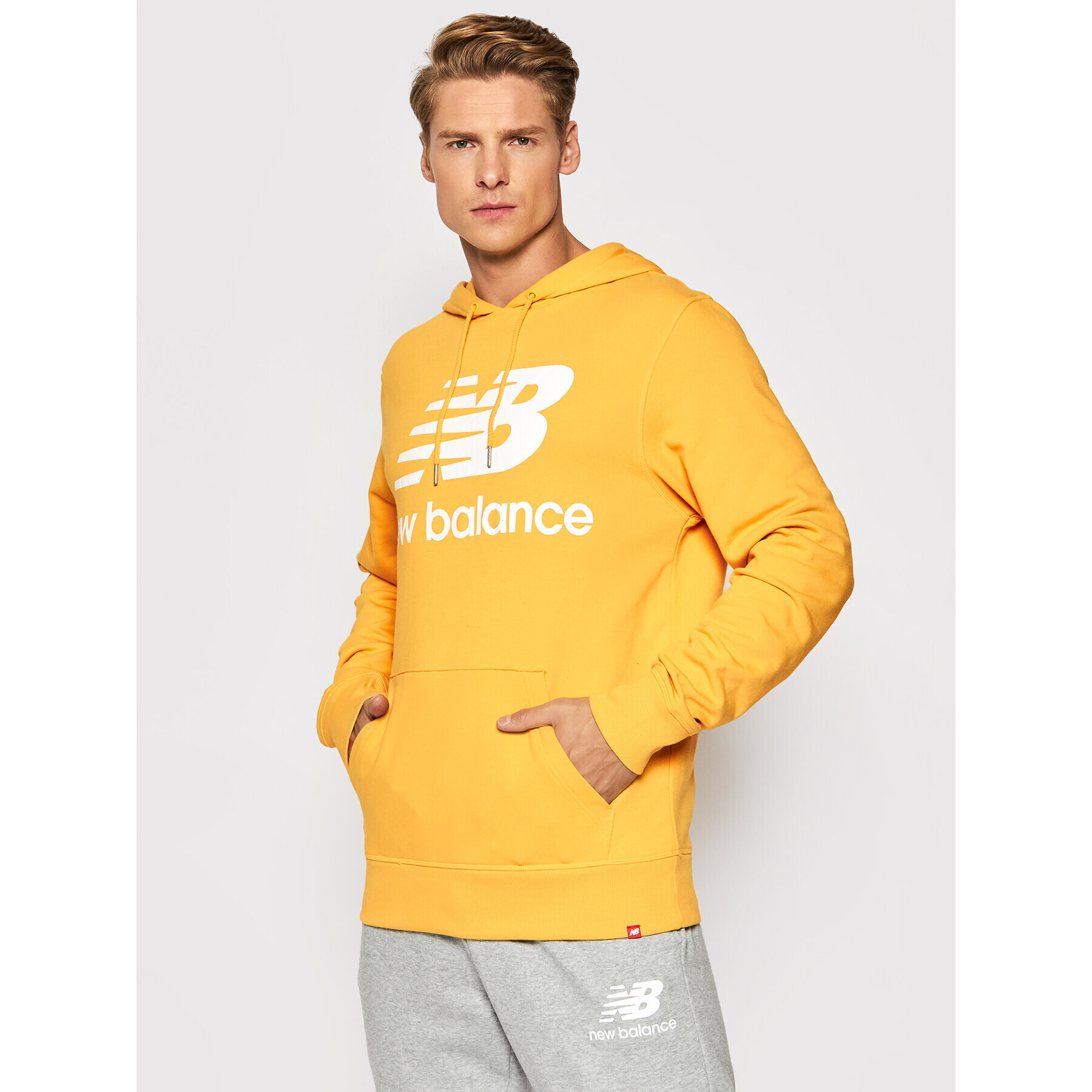 New Balance Bluză Essentials Stacked Logo Po MT03558 Galben Relaxed Fit - Pled.ro