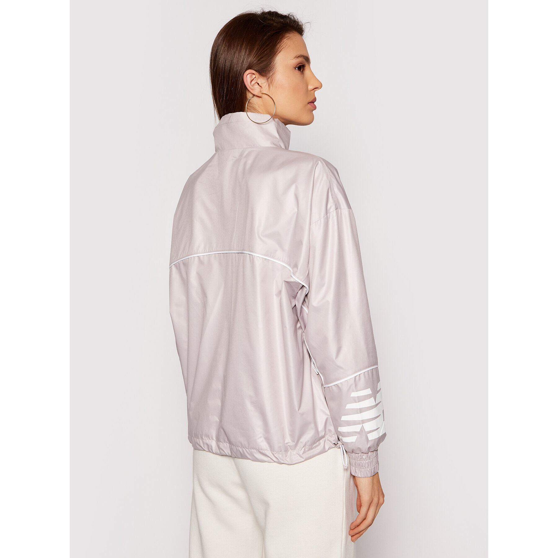 New Balance Geacă Athletics Windbreaker WJ11502 Gri Relaxed Fit - Pled.ro