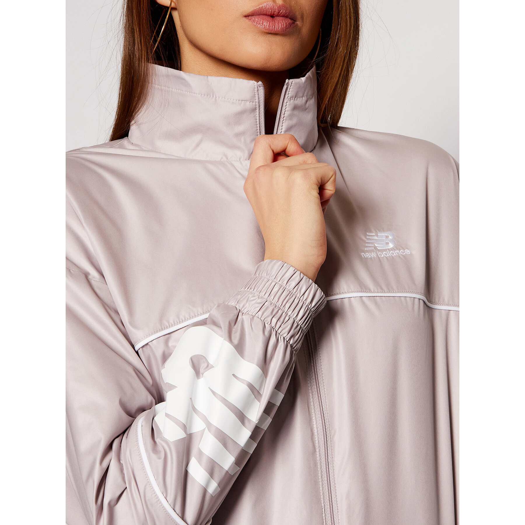 New Balance Geacă Athletics Windbreaker WJ11502 Gri Relaxed Fit - Pled.ro