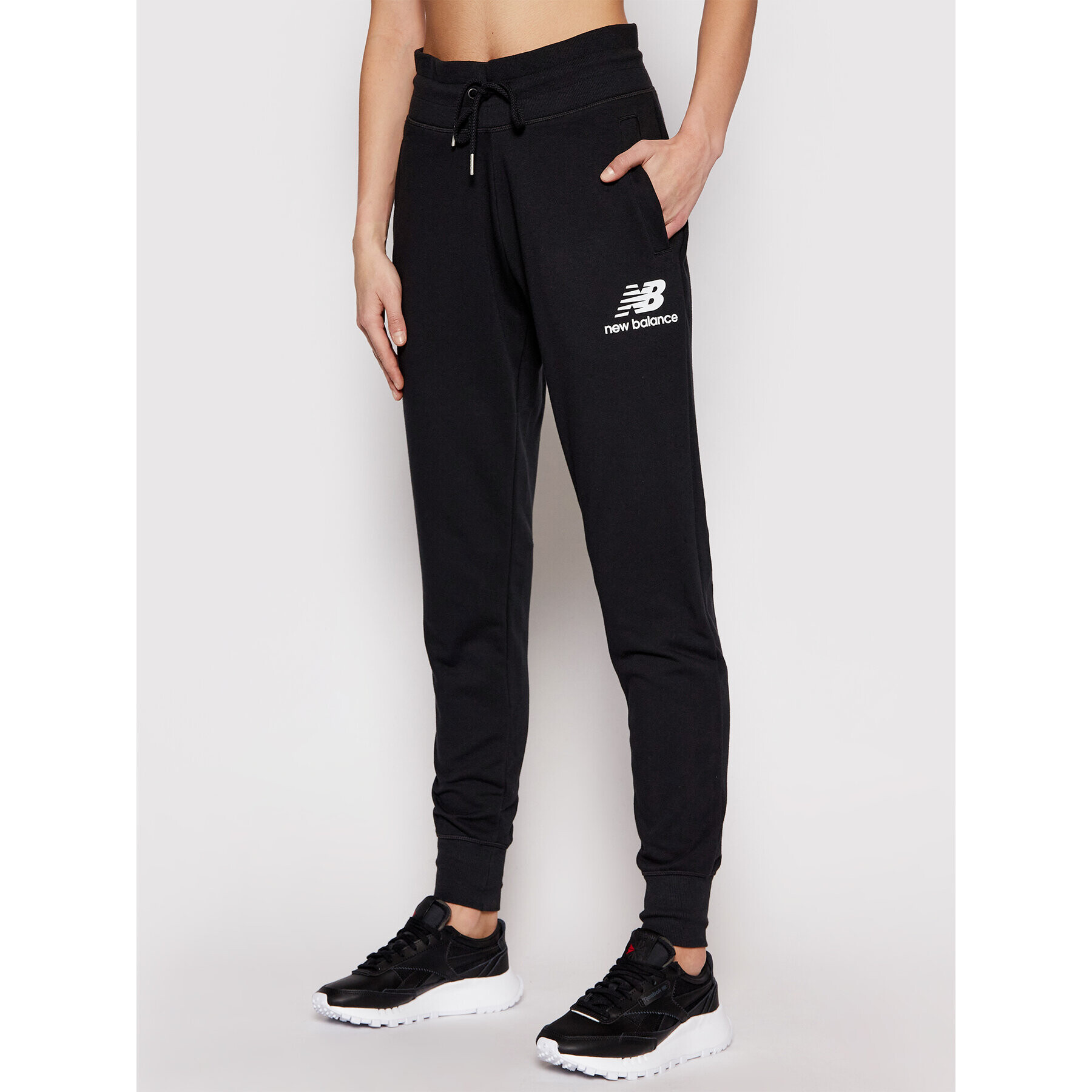 New Balance Pantaloni trening Esse NBWP03530 Negru Regular Fit - Pled.ro