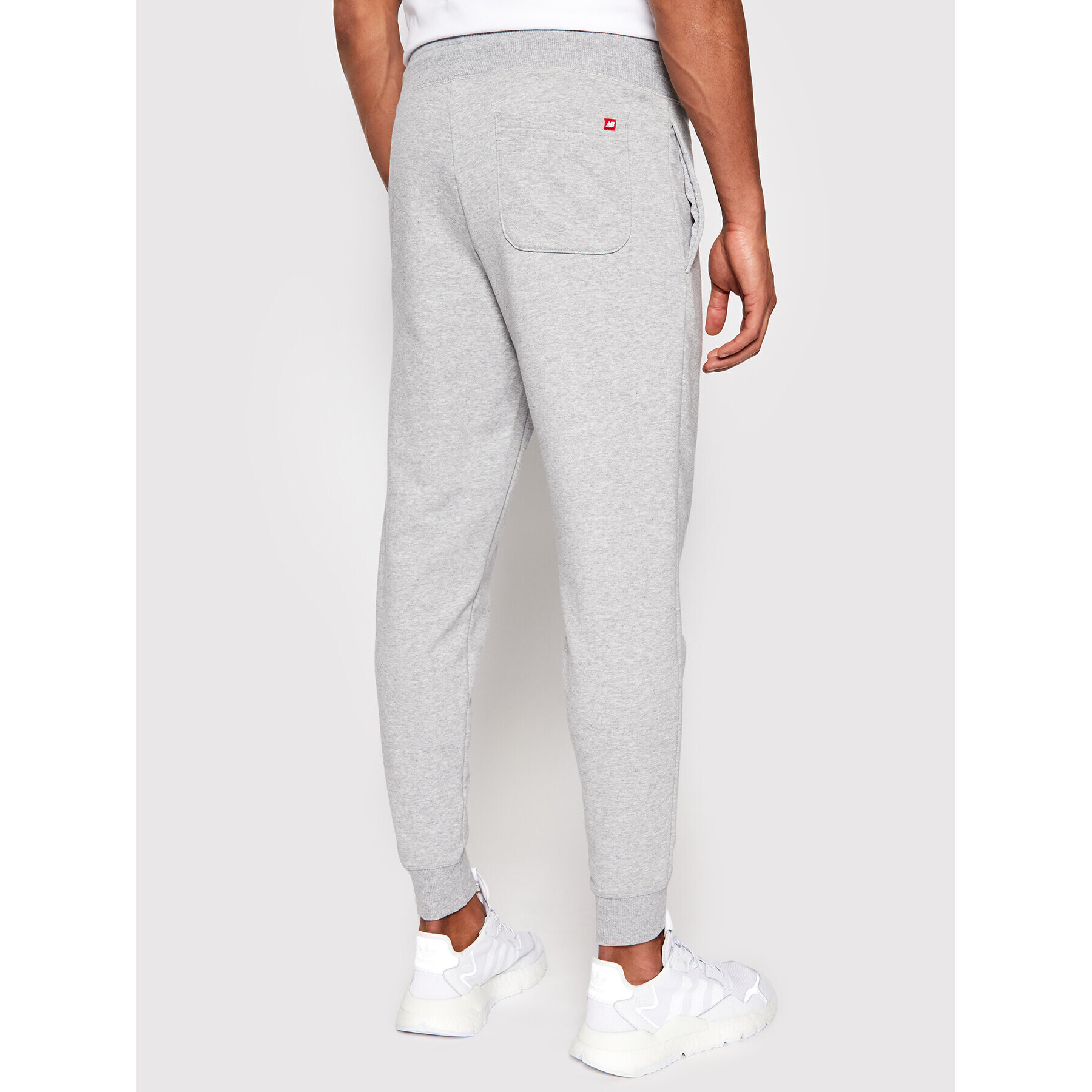 New Balance Pantaloni trening Essentials Stacked Logo MP03558 Gri Athletic Fit - Pled.ro