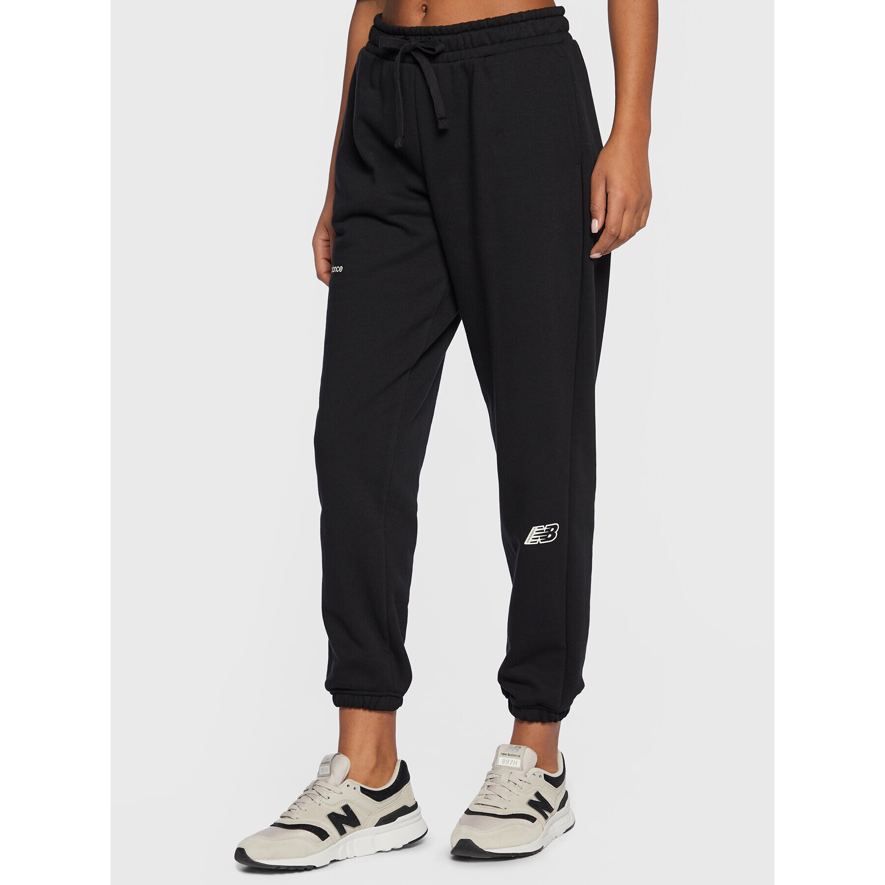 New Balance Pantaloni trening Essentials WP23508 Negru Relaxed Fit - Pled.ro