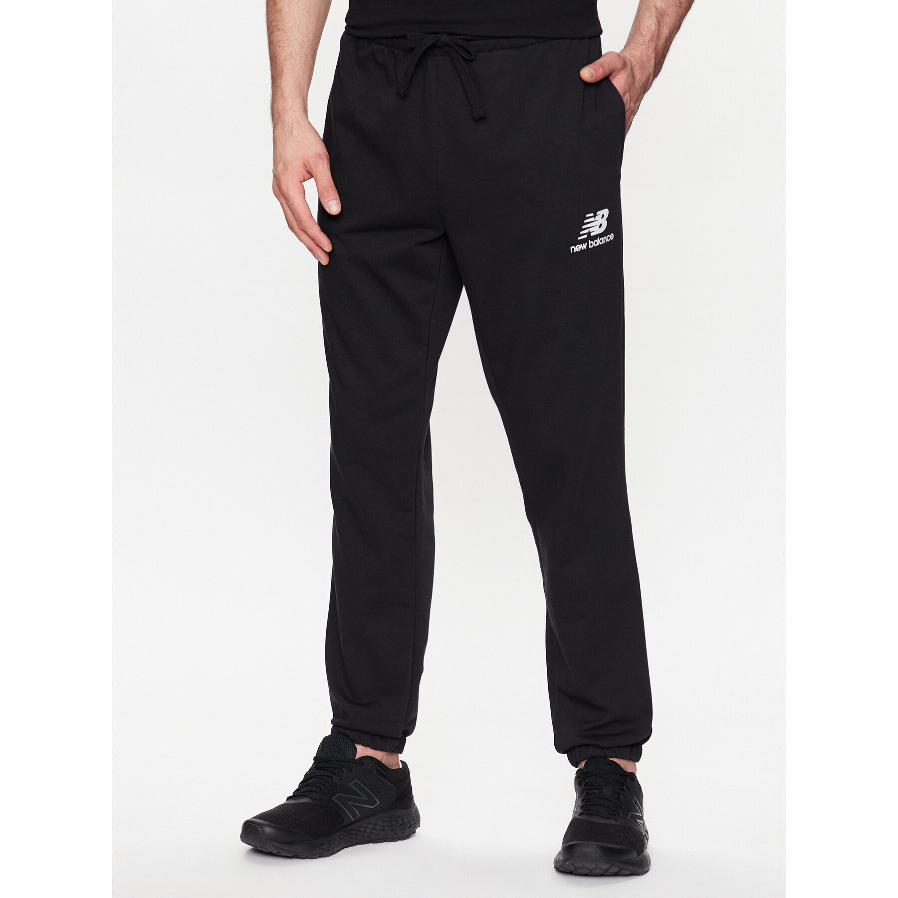 New Balance Pantaloni trening MP31539 Negru Regular Fit - Pled.ro