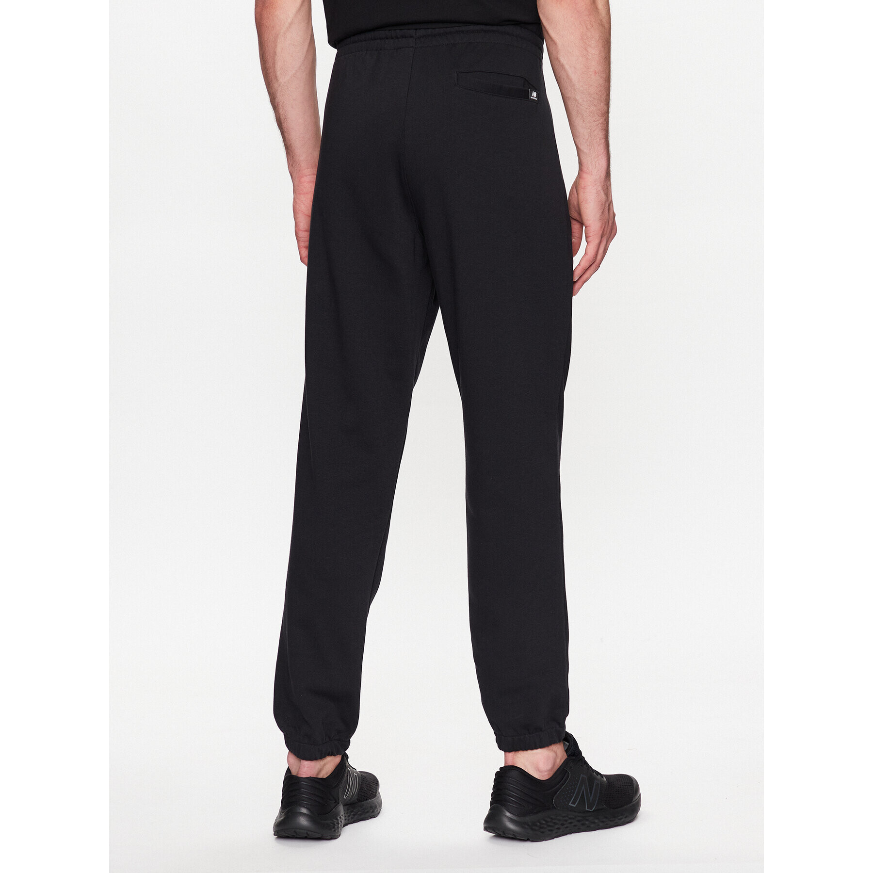 New Balance Pantaloni trening MP31539 Negru Regular Fit - Pled.ro