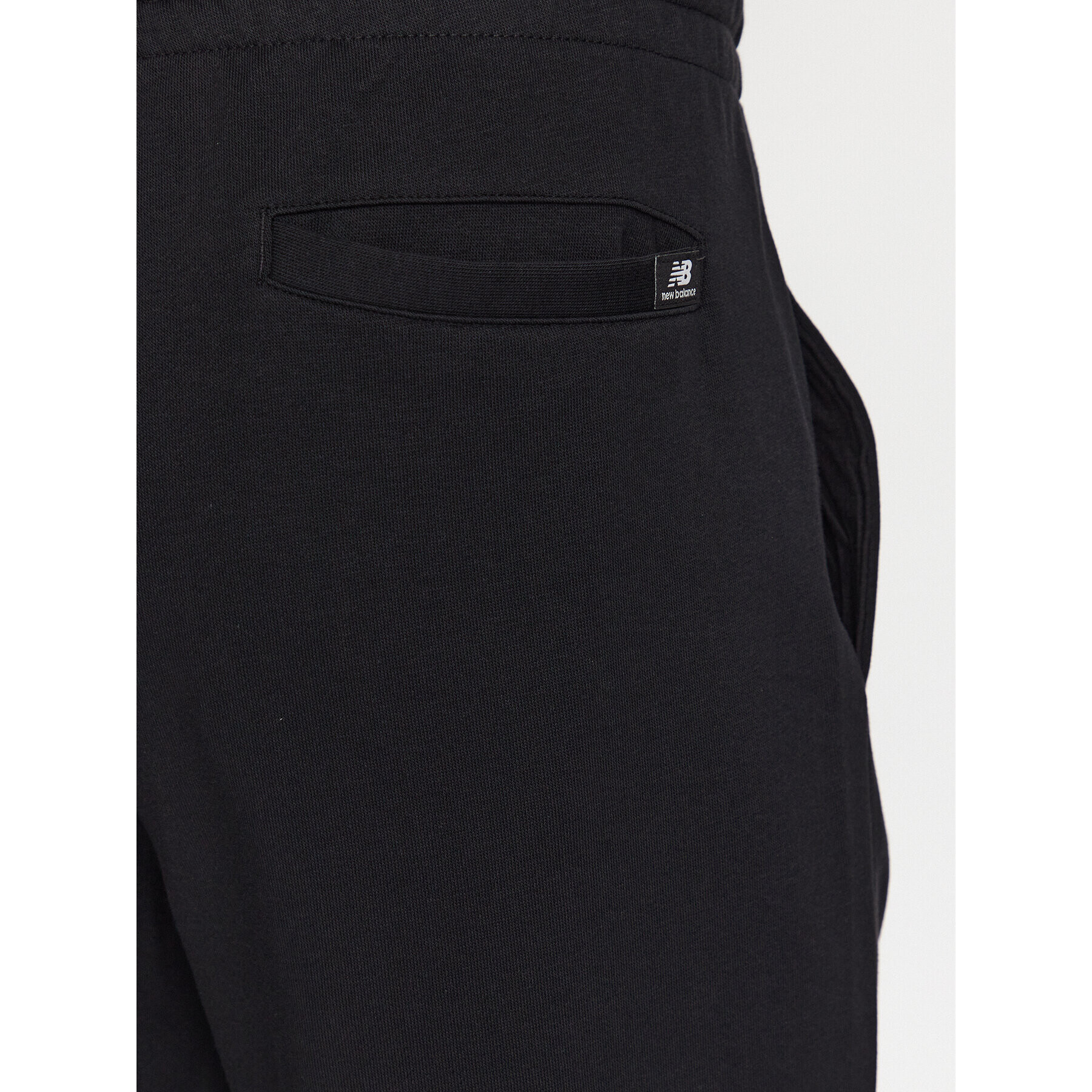 New Balance Pantaloni trening MP31539 Negru Regular Fit - Pled.ro