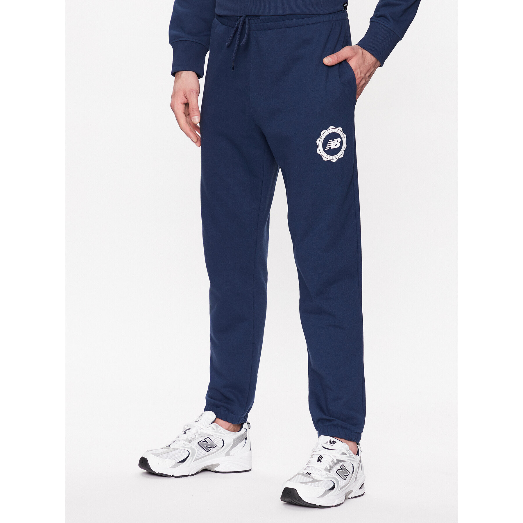 New Balance Pantaloni trening MP31902 Bleumarin Regular Fit - Pled.ro