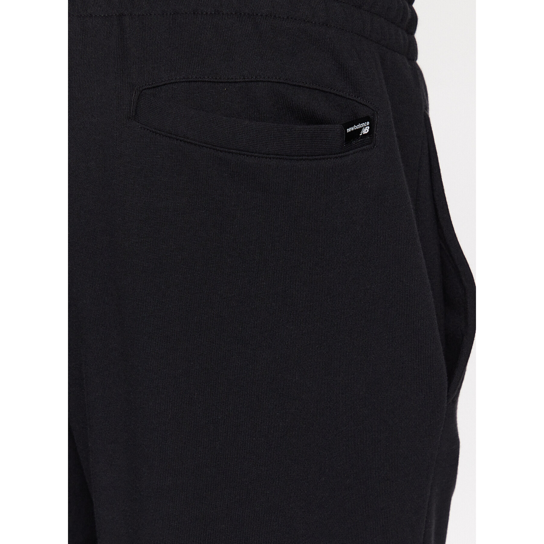 New Balance Pantaloni trening MP31902 Negru Regular Fit - Pled.ro