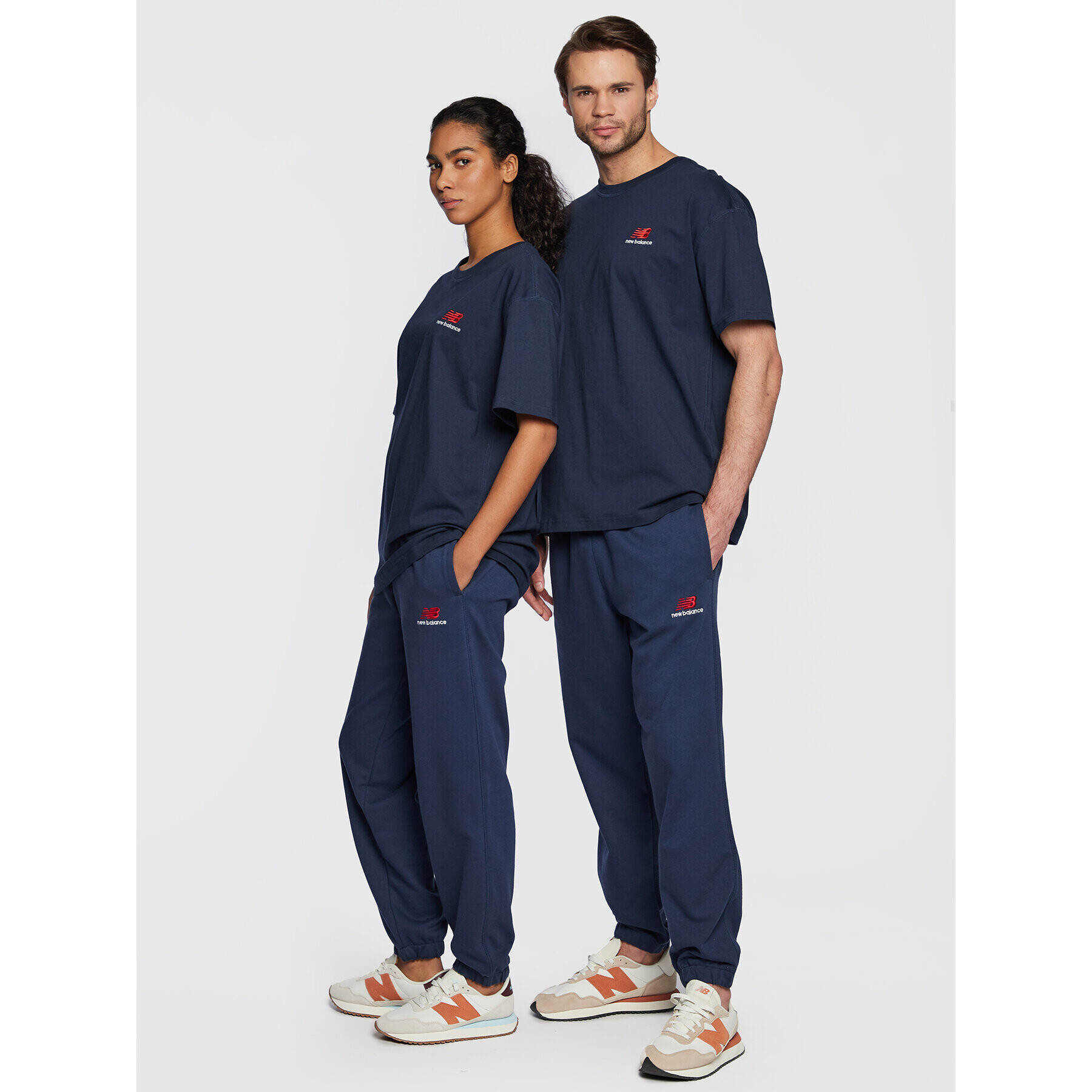 New Balance Pantaloni trening Unisex UP21500 Bleumarin Athletic Fit - Pled.ro