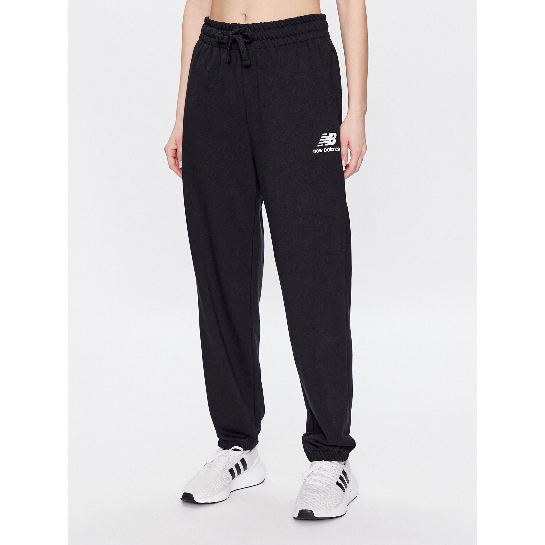 New Balance Pantaloni trening WP31530 Negru Relaxed Fit - Pled.ro