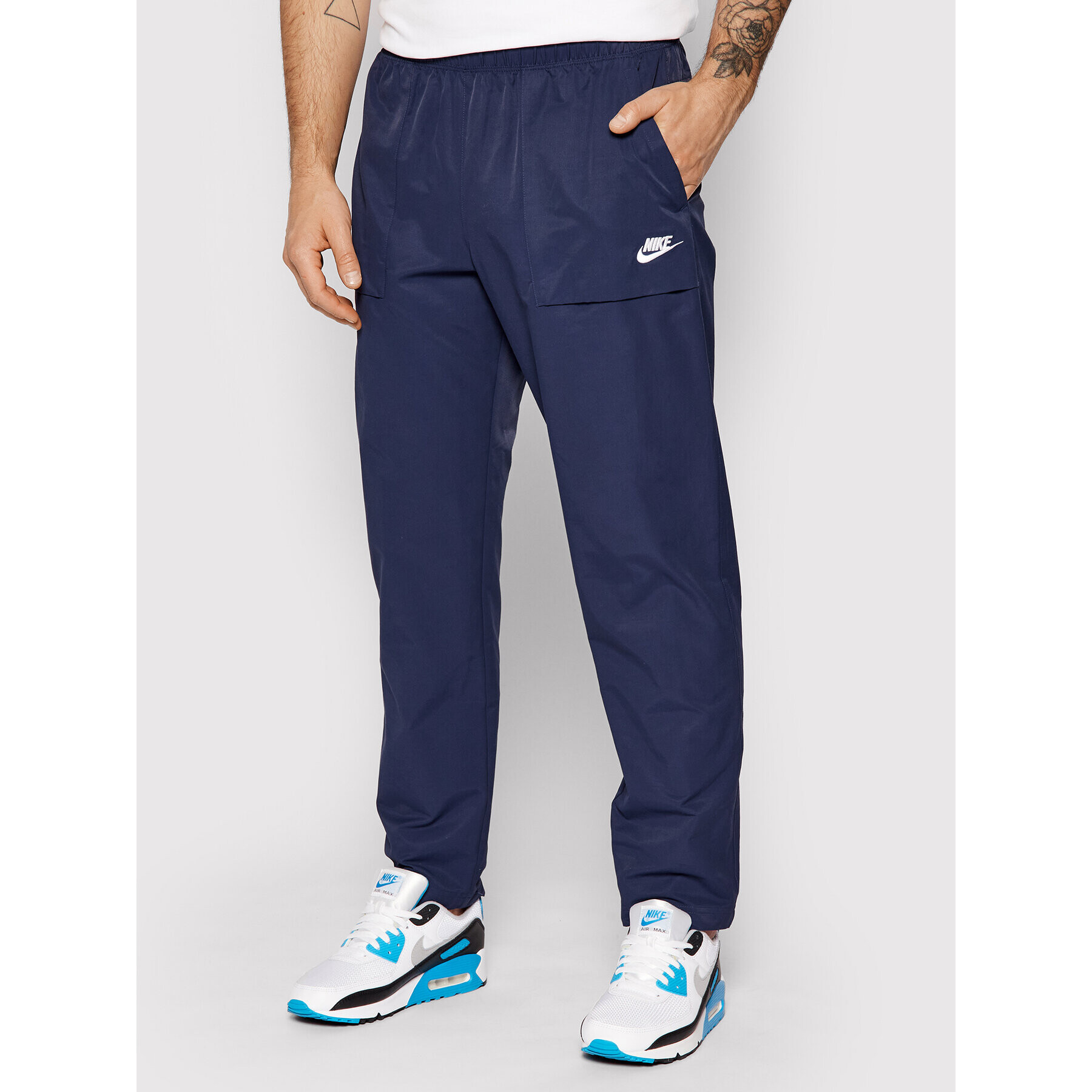 Nike Pantaloni din material City Edition CZ9927 Bleumarin Standard Fit - Pled.ro