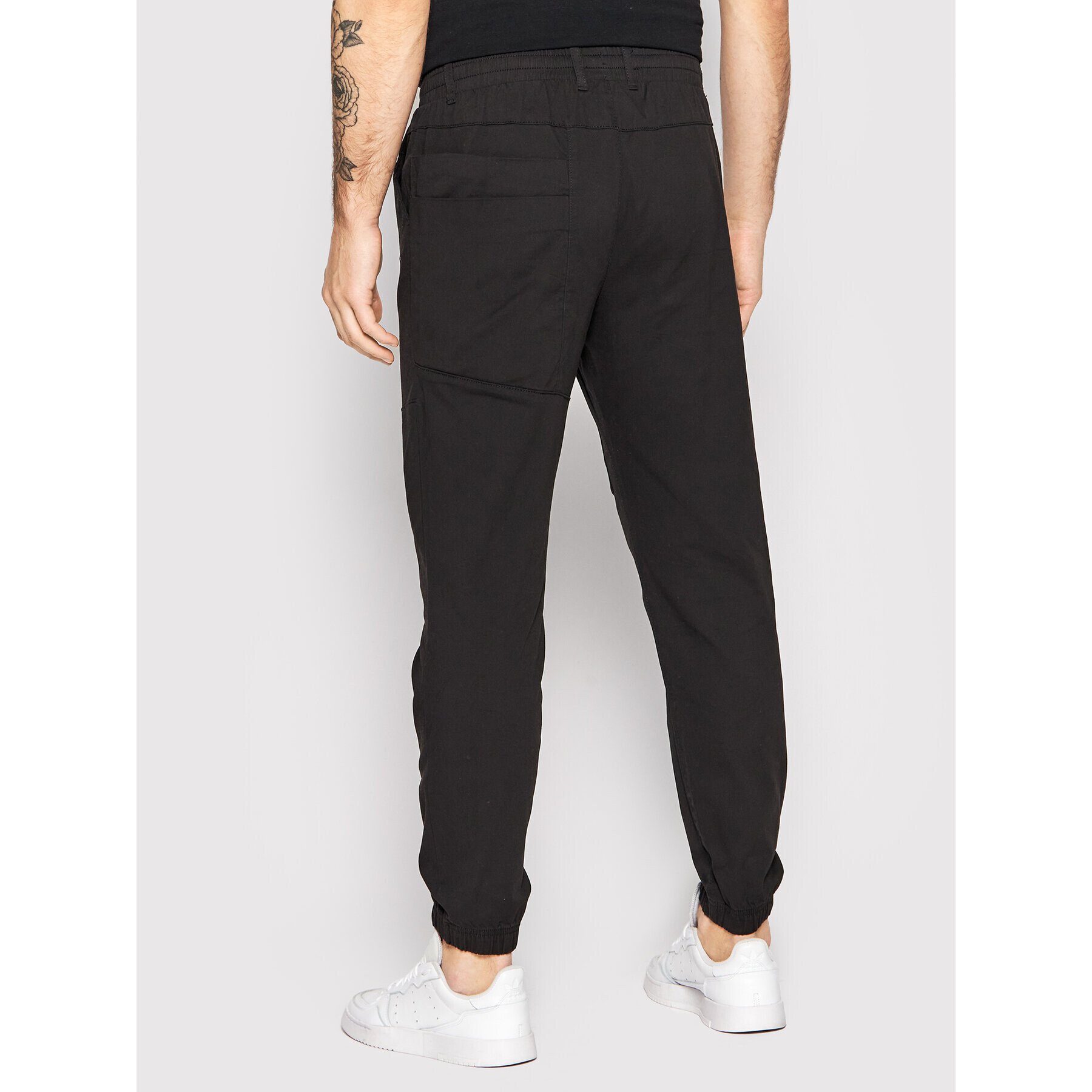 Outhorn Pantaloni din material SPMC600 Negru Regular Fit - Pled.ro