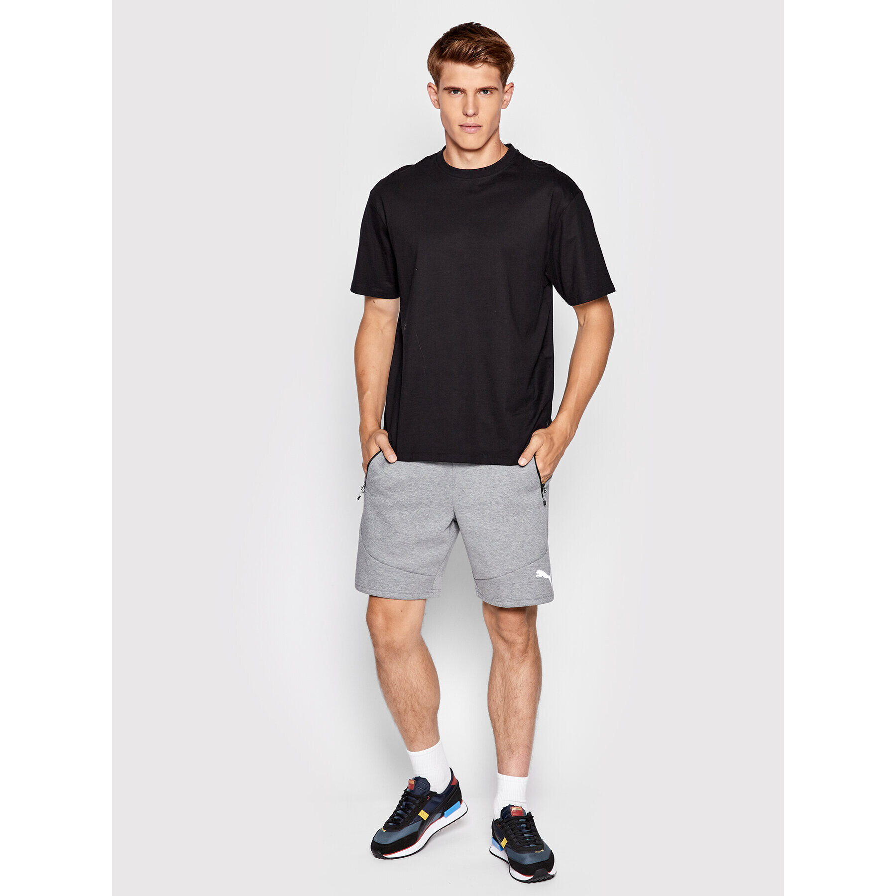 Puma Pantaloni scurți sport Evostripe 847403 Gri Regular Fit - Pled.ro