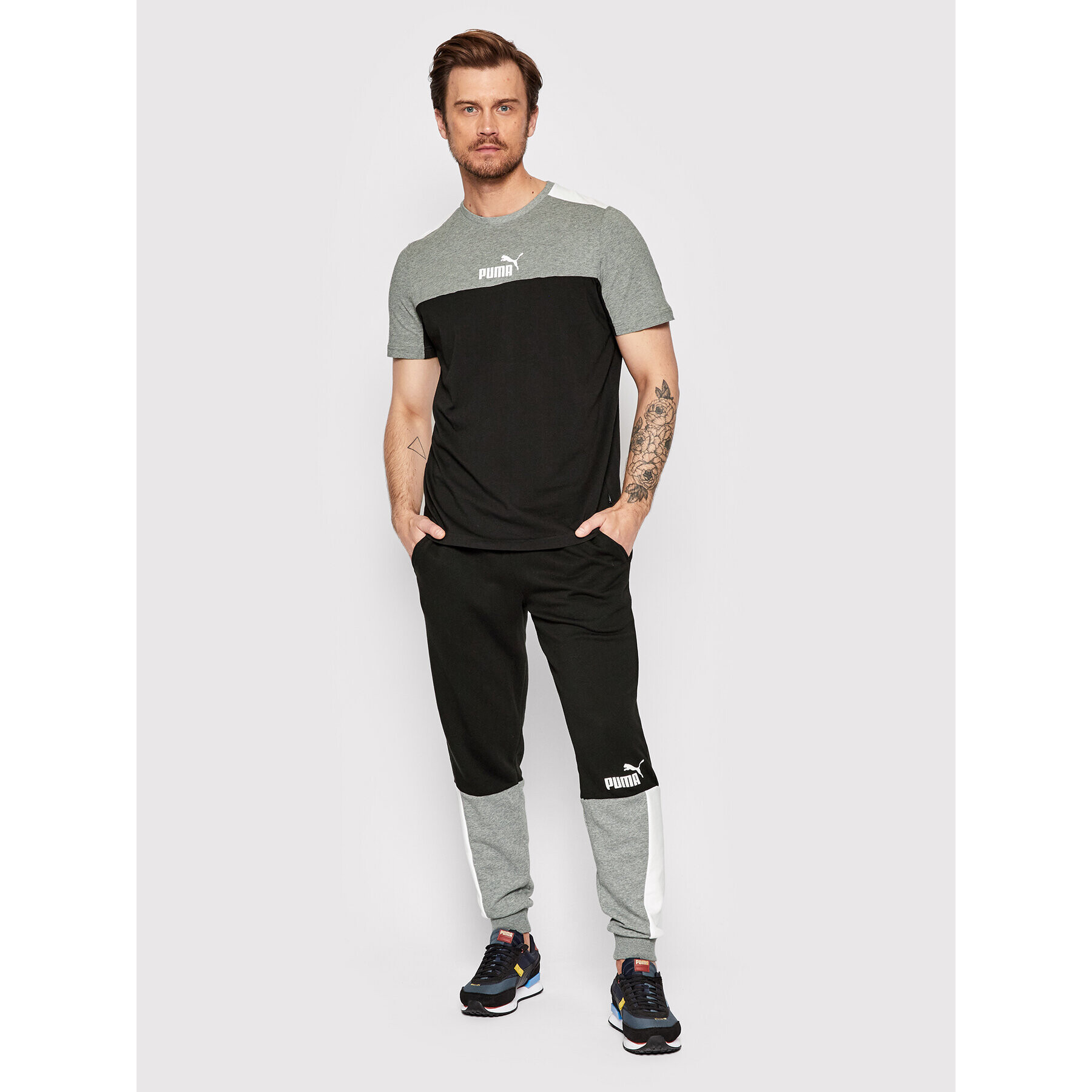 Puma Pantaloni trening Ess + Block 848007 Negru Regular Fit - Pled.ro