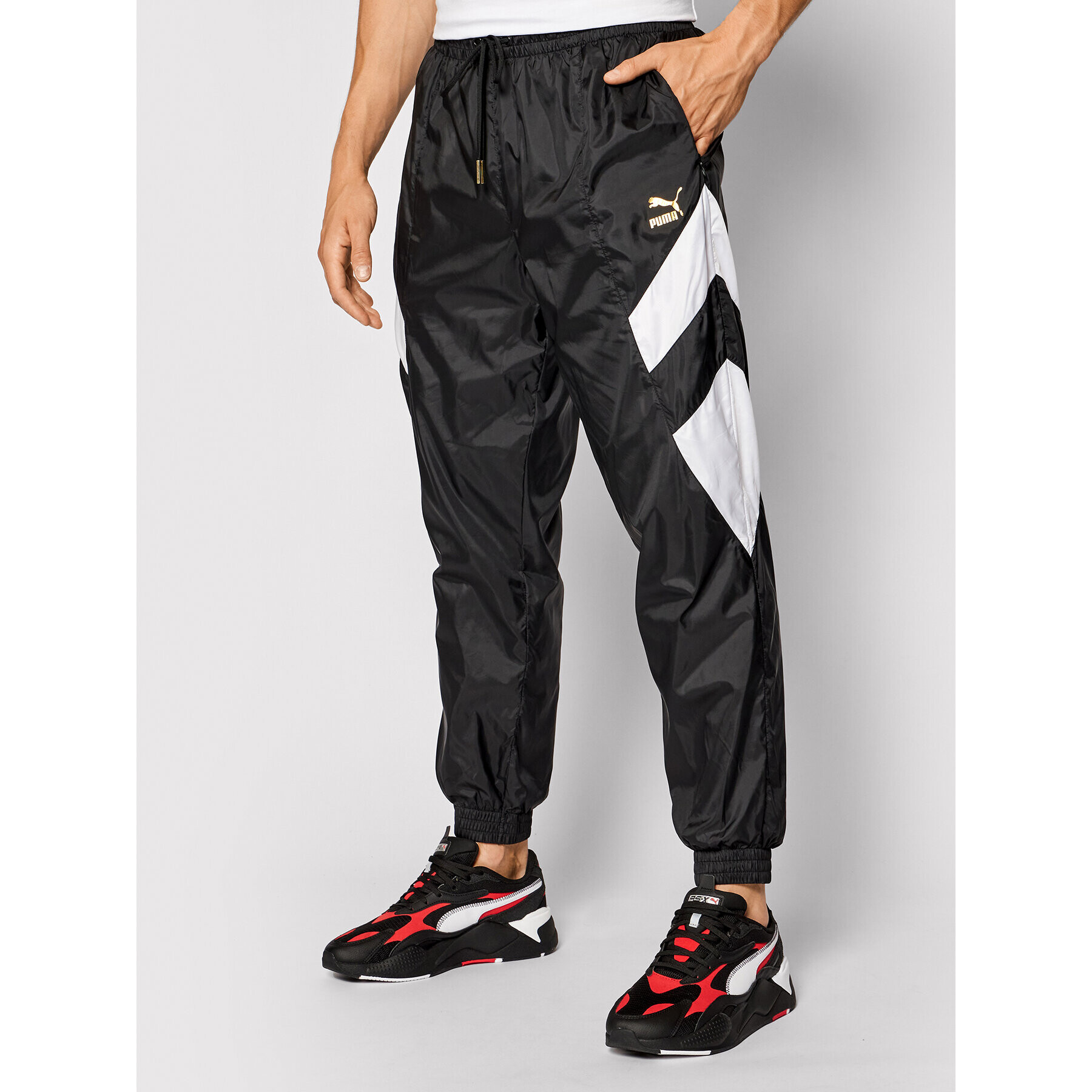 Puma Pantaloni trening Tfs Worldhood Track 597611 Negru Regular Fit - Pled.ro