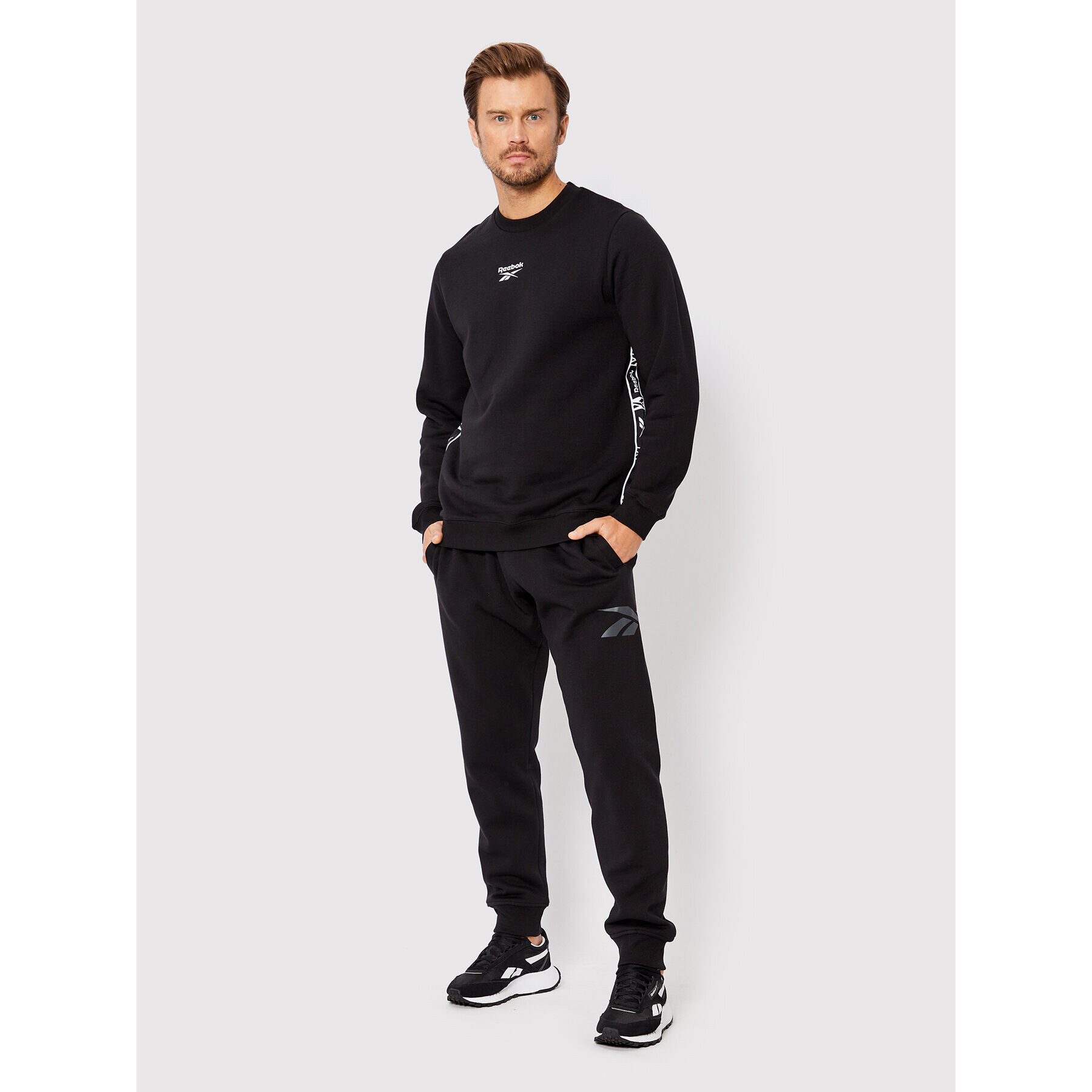 Reebok Bluză Identity Tape HB5974 Negru Regular Fit - Pled.ro