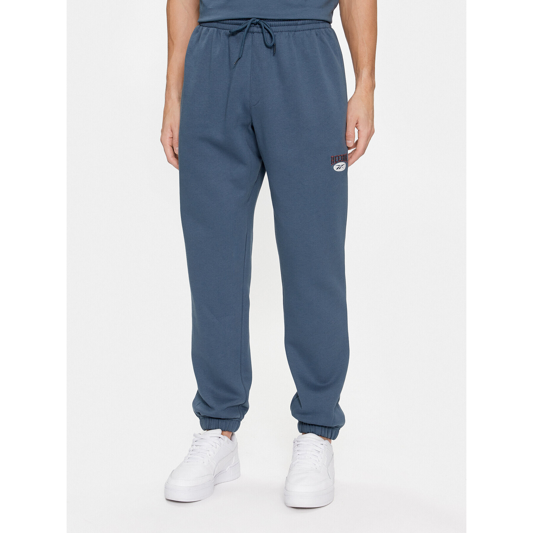 Reebok Pantaloni trening Archive Essentials IM1526 Albastru Regular Fit - Pled.ro