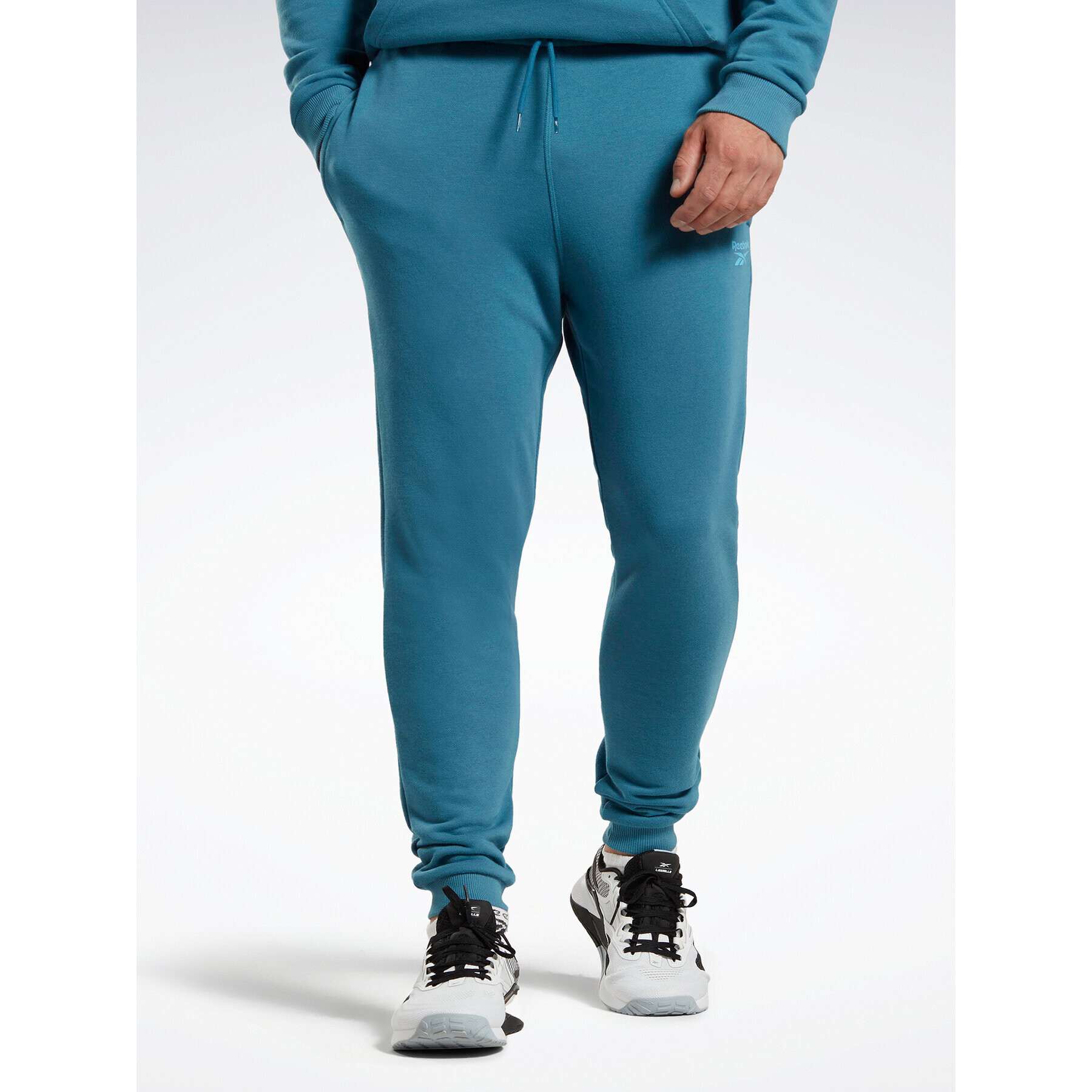 Reebok Pantaloni trening Identity French Terry Joggers H49680 Albastru Regular Fit - Pled.ro