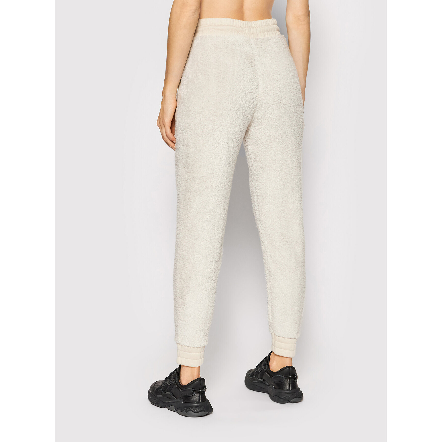 Reebok Pantaloni trening MYT Cozy GV3289 Bej Regular Fit - Pled.ro