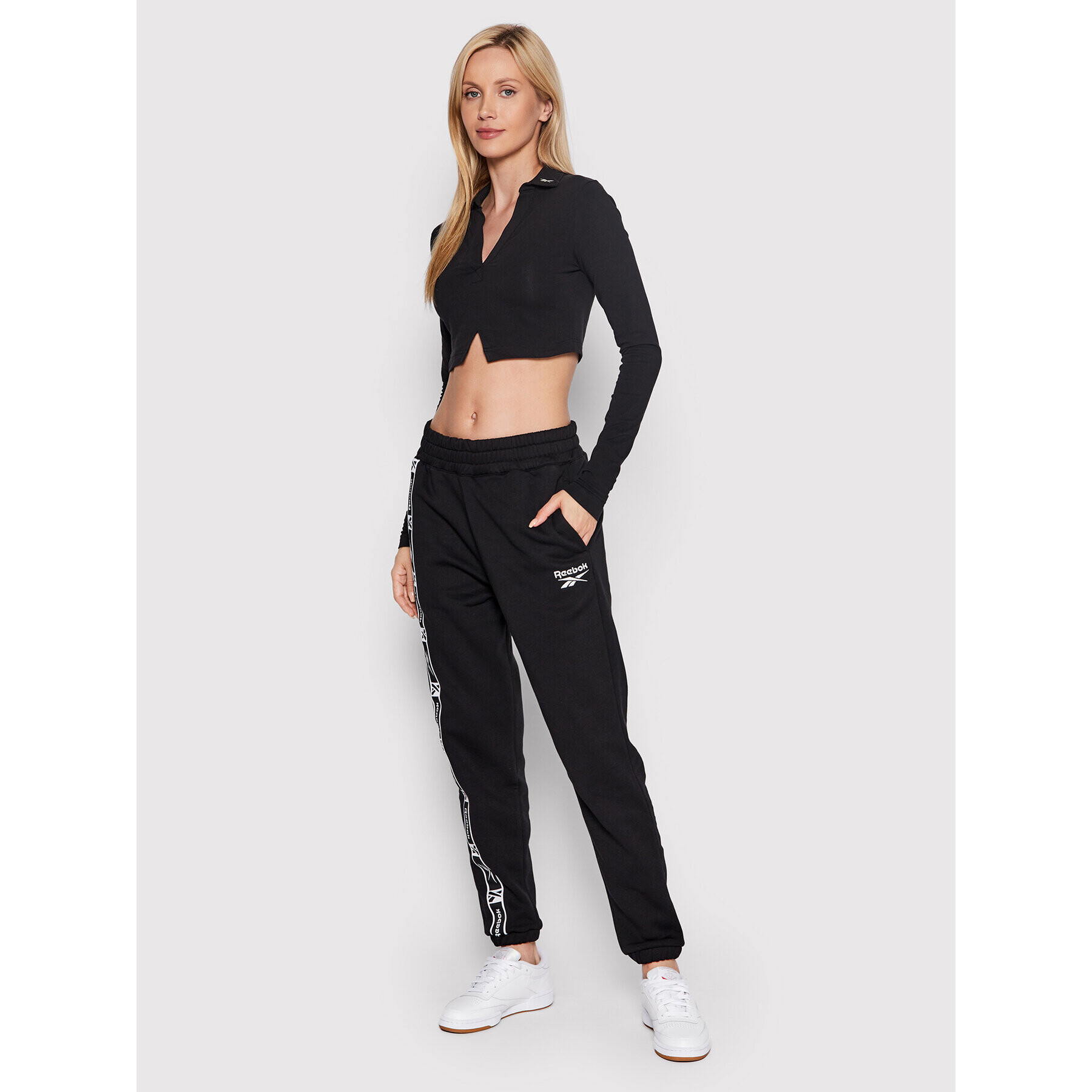 Reebok Pantaloni trening Tape Pack HB2261 Negru Relaxed Fit - Pled.ro