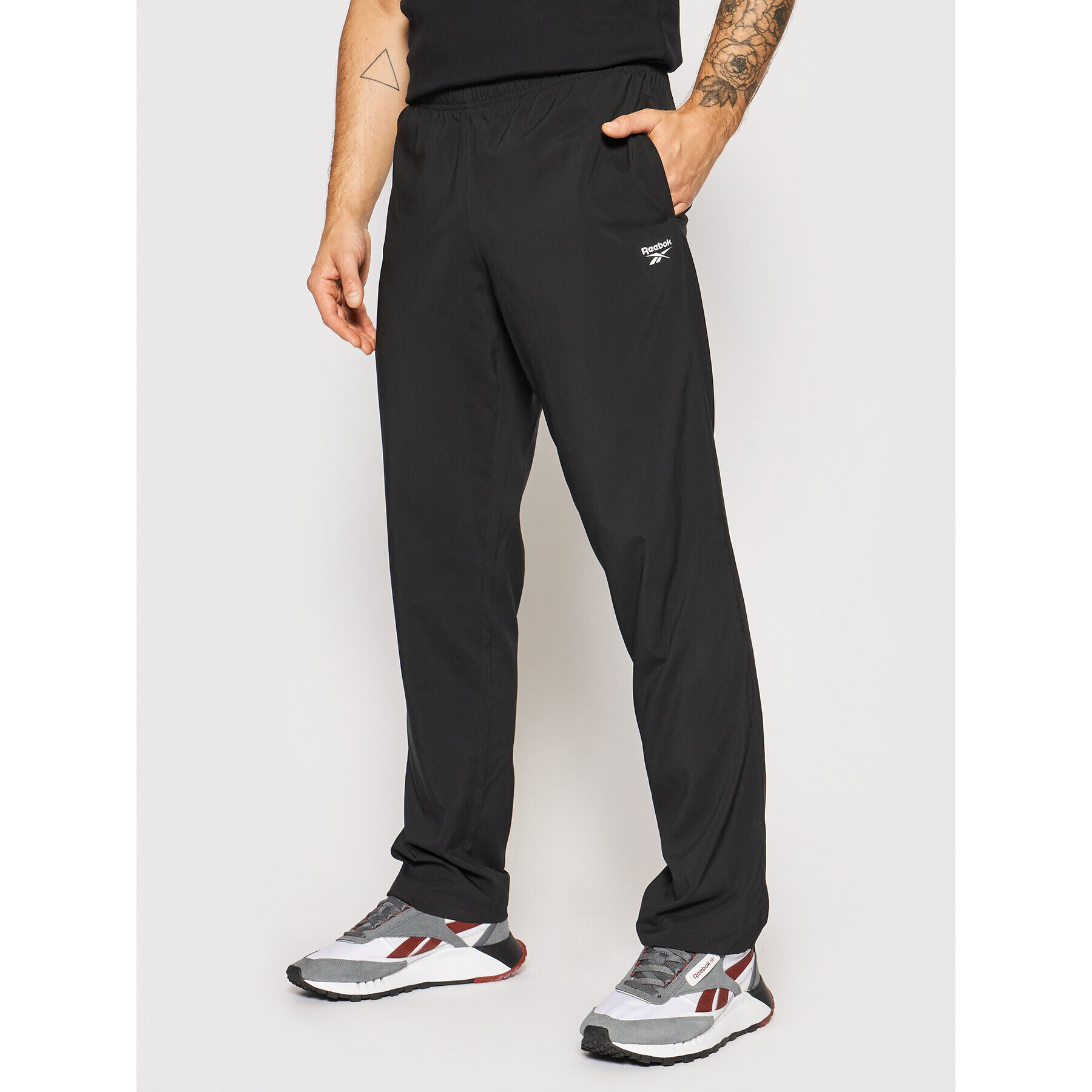 Reebok Pantaloni trening Training Essentials Woven FP9170 Negru Regular Fit - Pled.ro