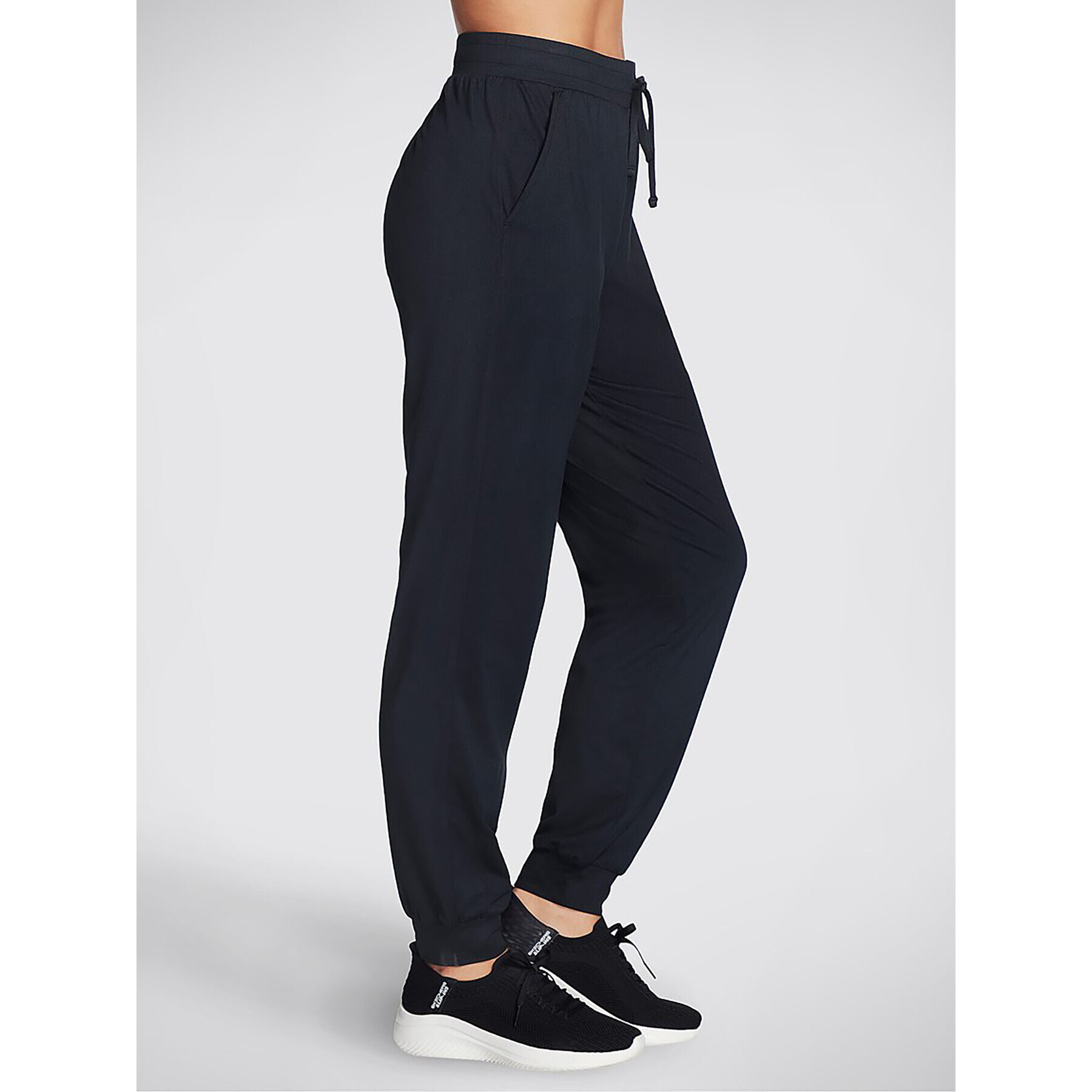 Skechers Pantaloni trening Godri Swift Jogger WPT254 Negru Regular Fit - Pled.ro