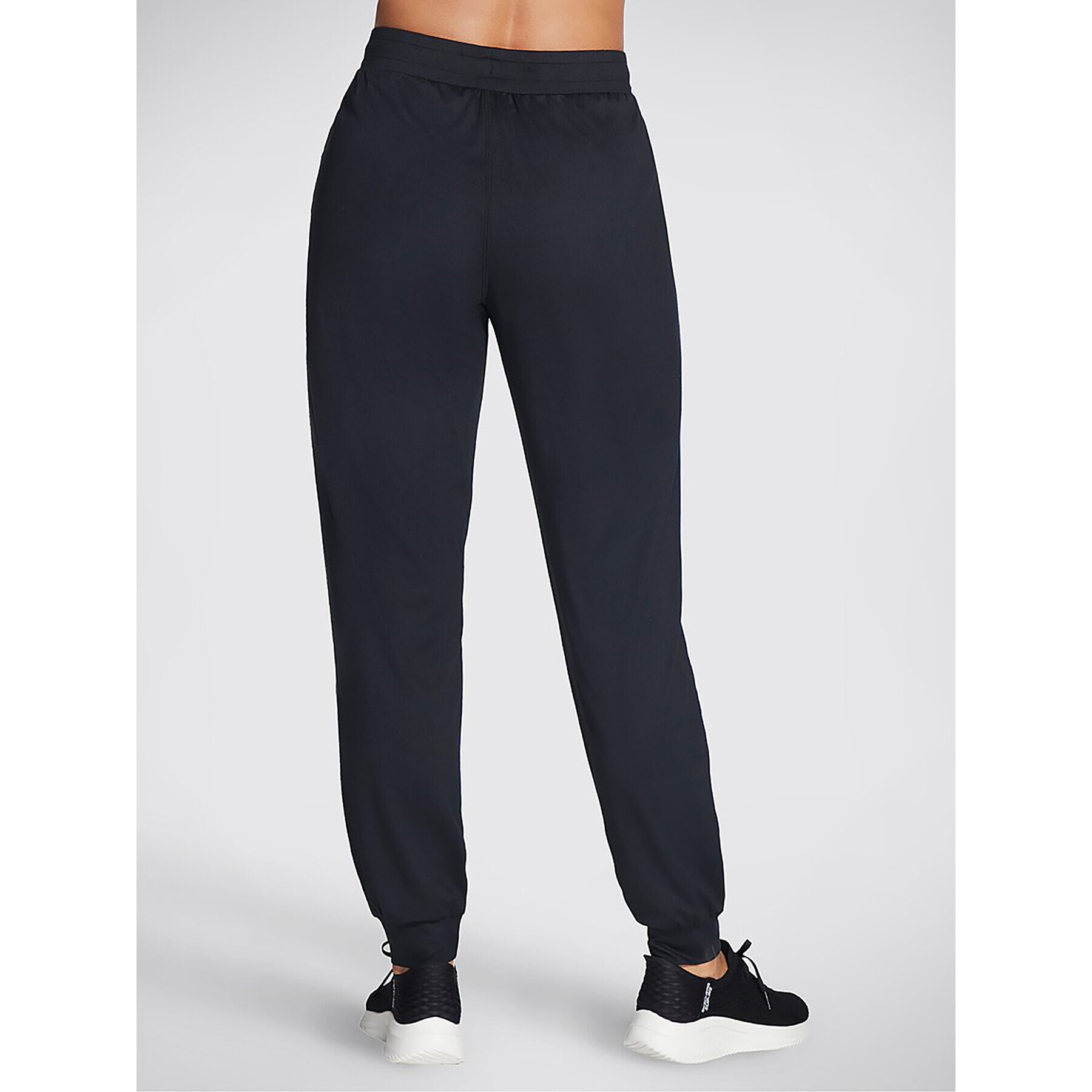 Skechers Pantaloni trening Godri Swift Jogger WPT254 Negru Regular Fit - Pled.ro