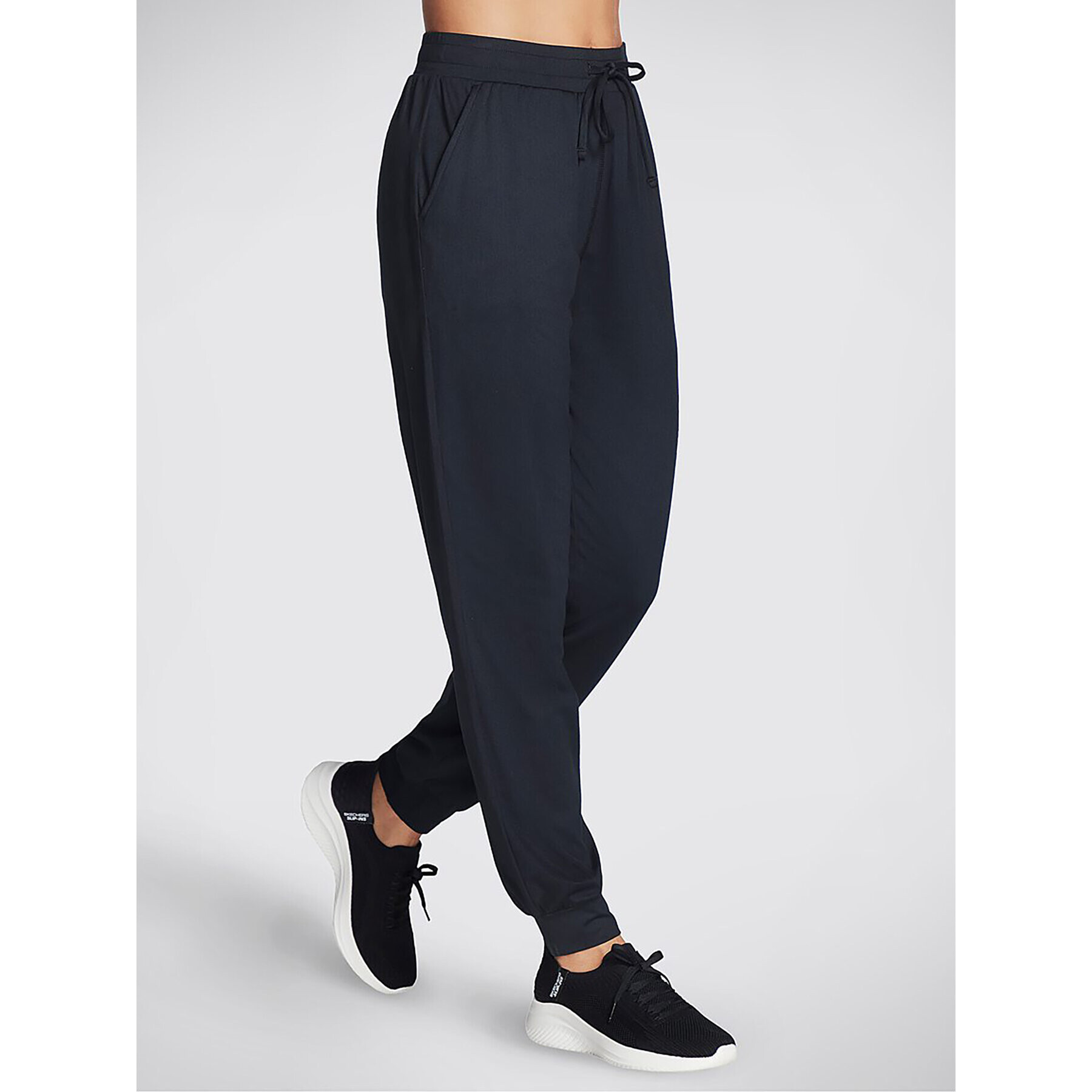 Skechers Pantaloni trening Godri Swift Jogger WPT254 Negru Regular Fit - Pled.ro