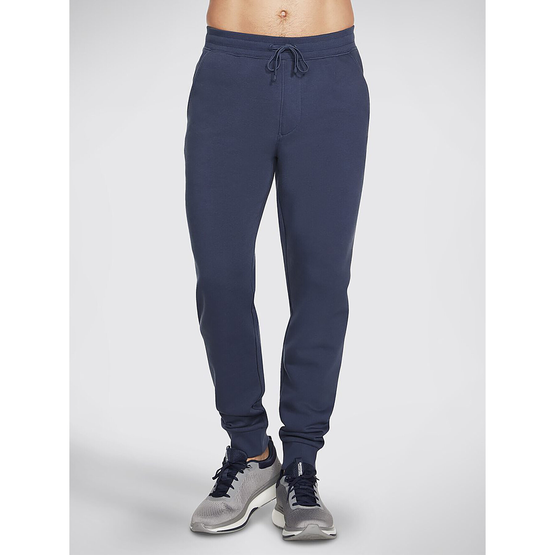 Skechers Pantaloni trening Sweats Essential Jogger PT16 Gri Regular Fit - Pled.ro