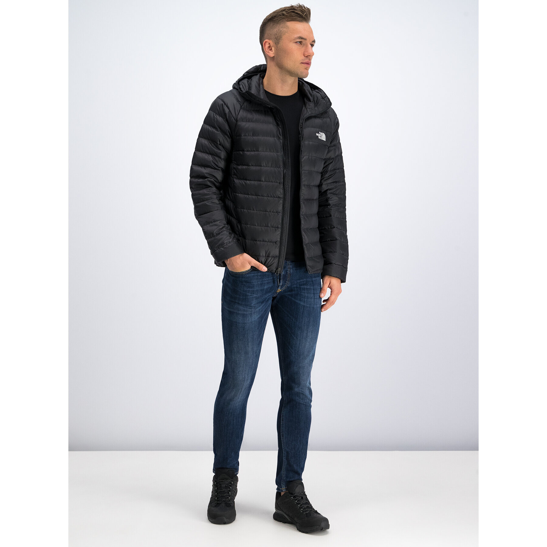 The North Face Geacă din puf Travail NF0A39N4 Negru Regular Fit - Pled.ro