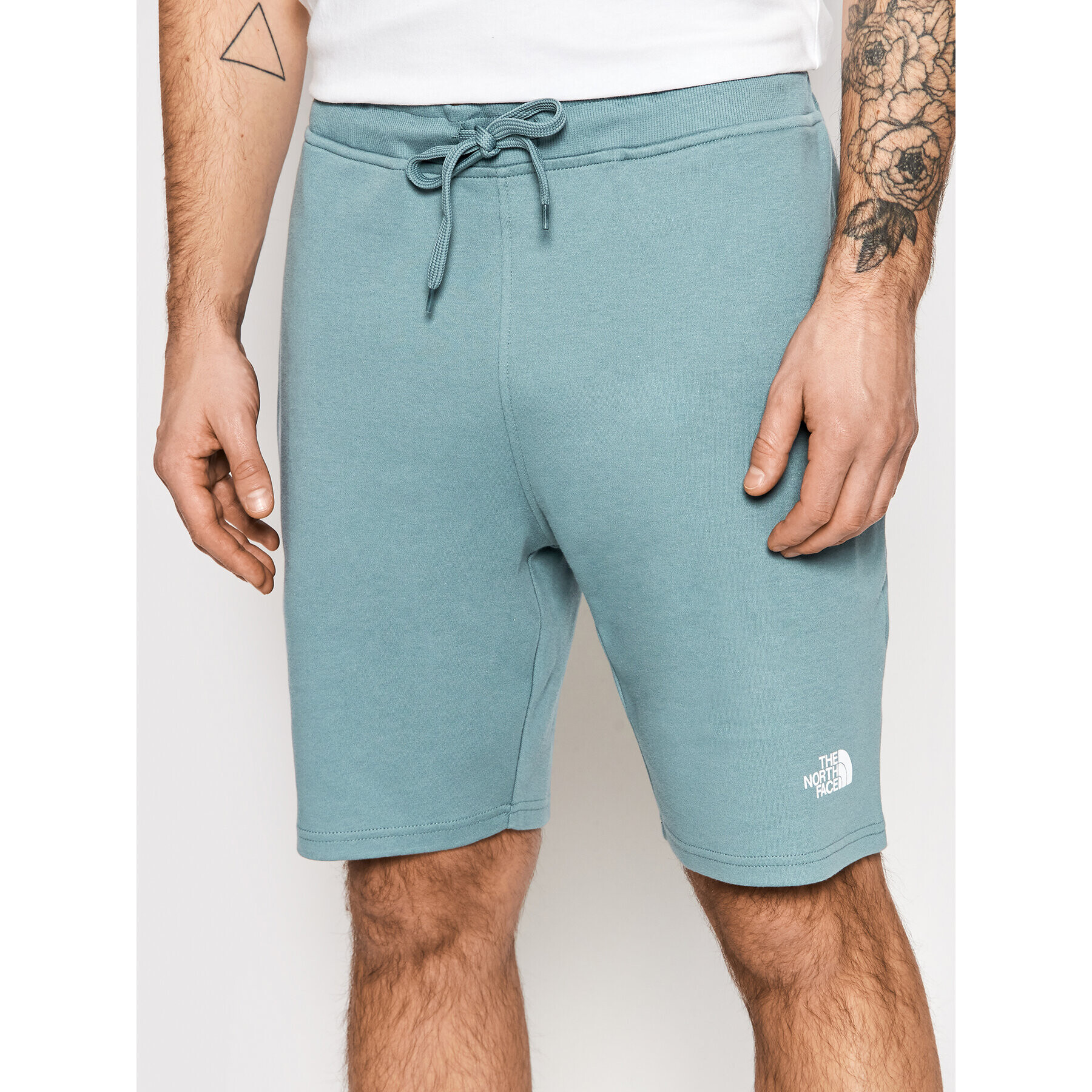 The North Face Pantaloni scurți sport Graphic NF0A3S4F Gri Regular Fit - Pled.ro