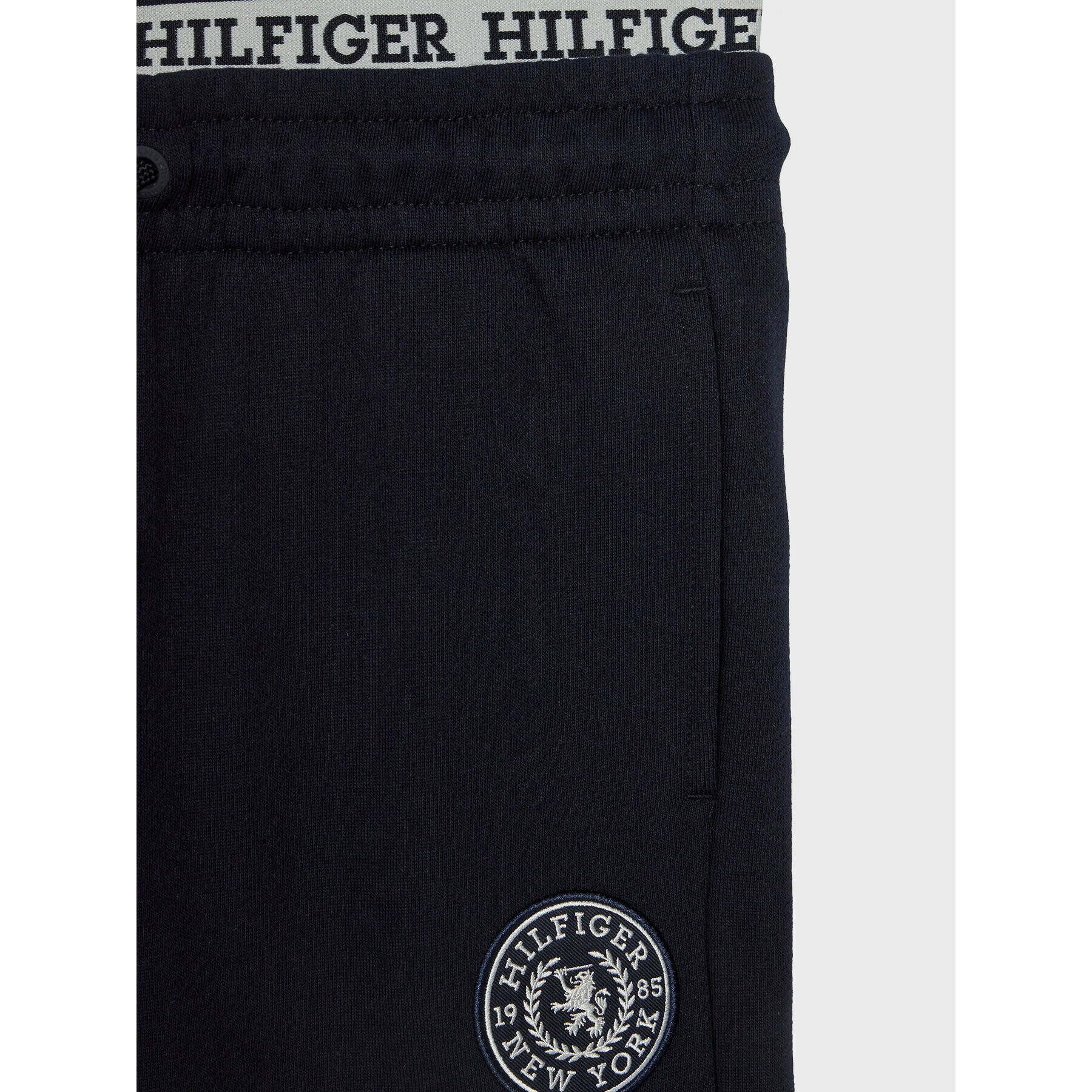 Tommy Hilfiger Pantaloni trening Crest Logo KB0KB08700 D Bleumarin Relaxed Fit - Pled.ro