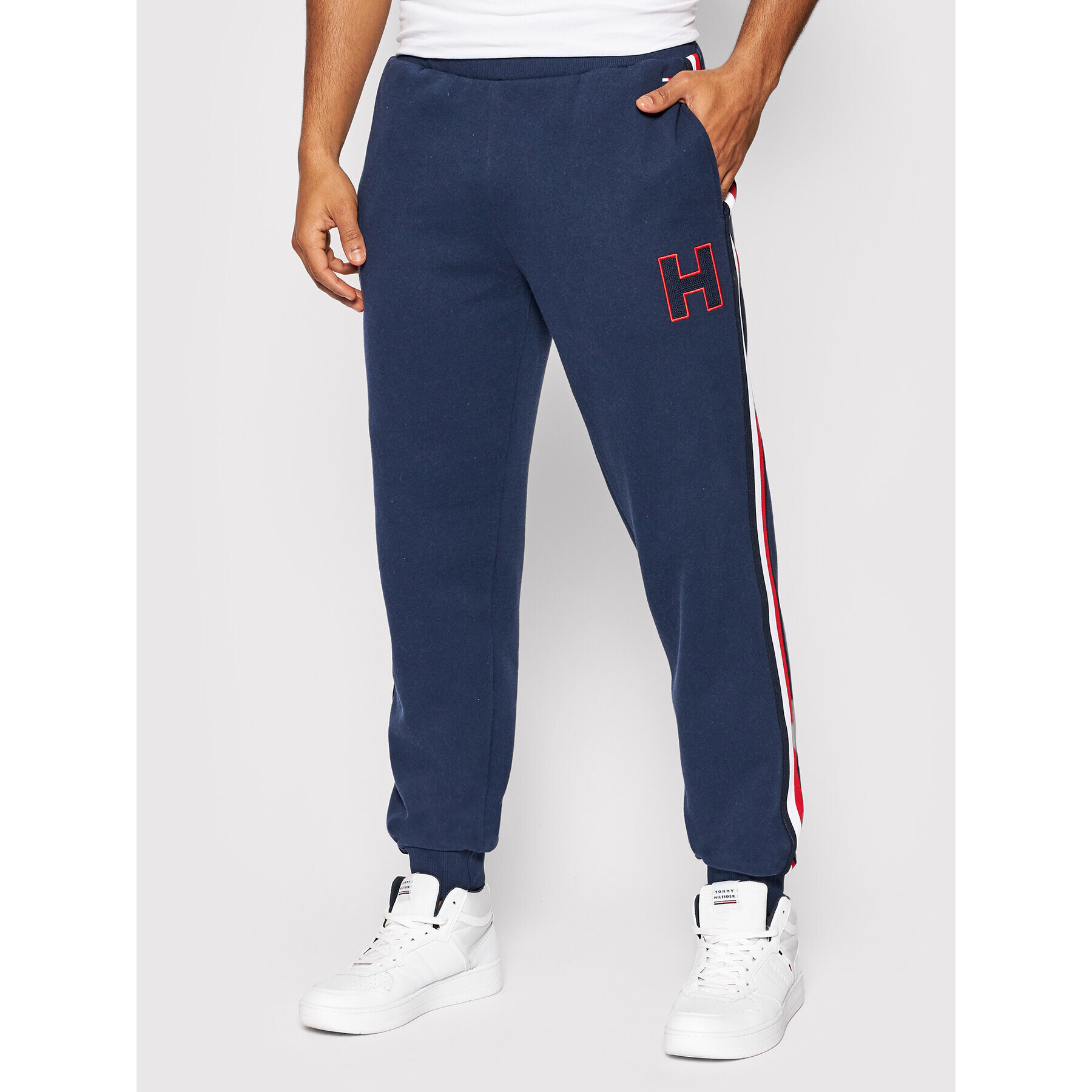 Tommy Hilfiger Pantaloni trening Hwk UM0UM02353 Bleumarin Regular Fit - Pled.ro