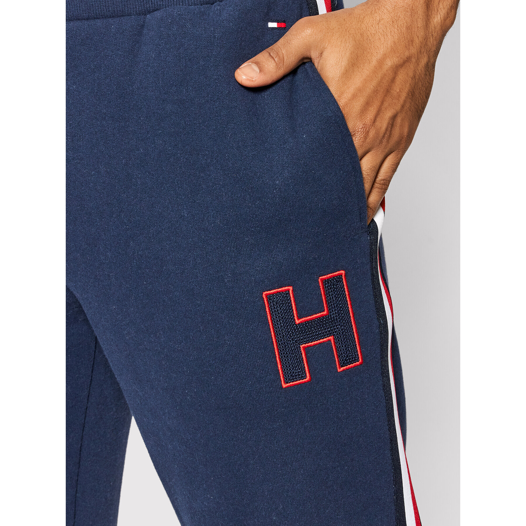 Tommy Hilfiger Pantaloni trening Hwk UM0UM02353 Bleumarin Regular Fit - Pled.ro