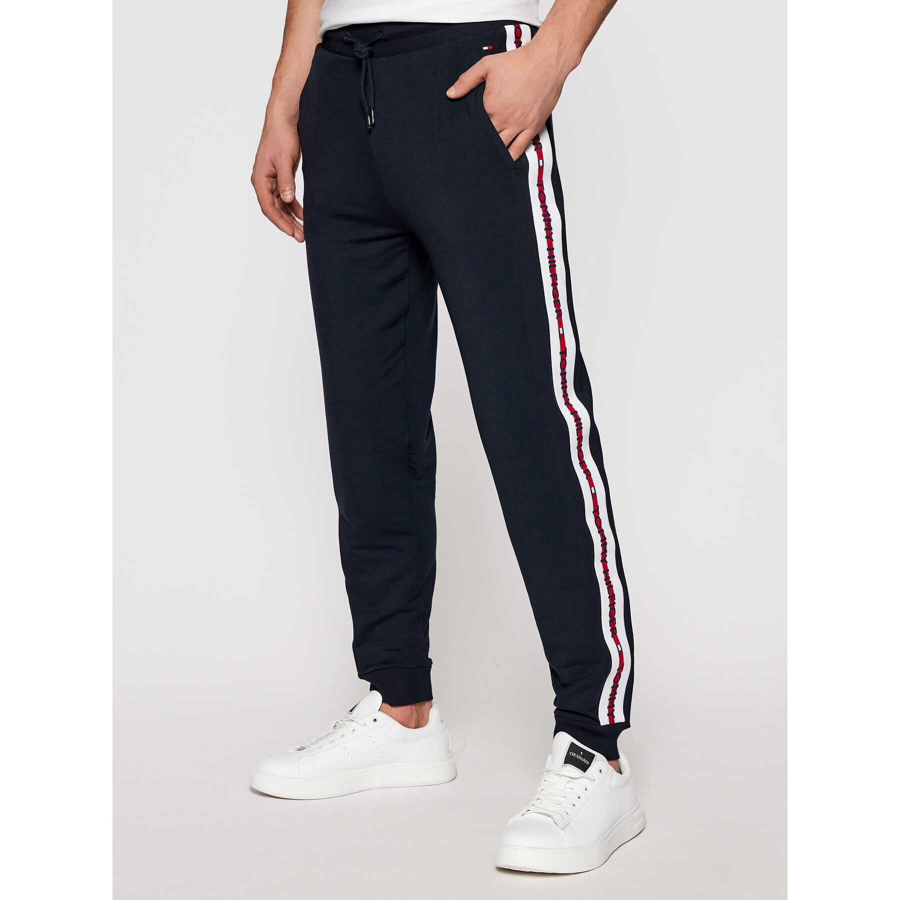 Tommy Hilfiger Pantaloni trening Repeat Logo UM0UM01918 Bleumarin Regular Fit - Pled.ro