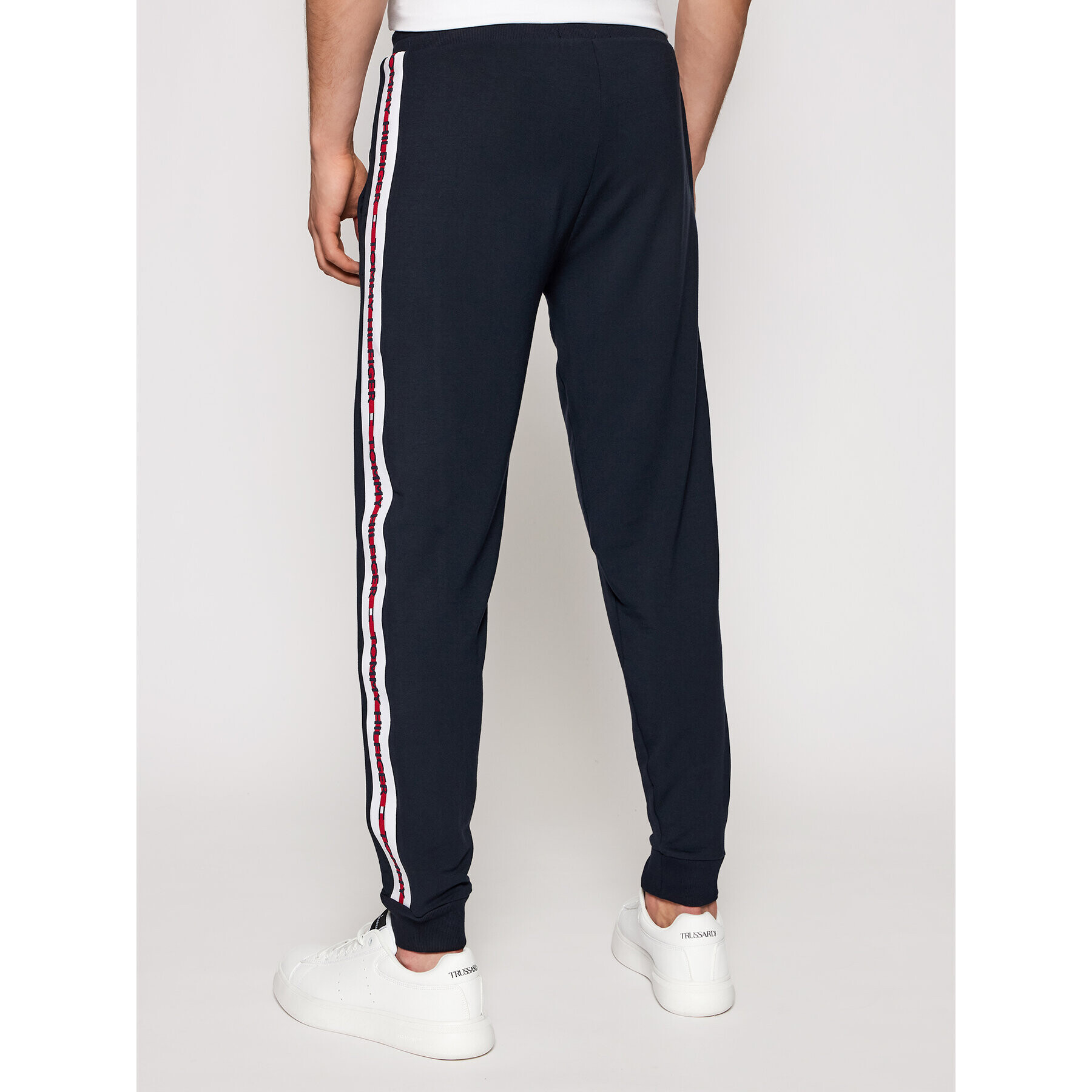 Tommy Hilfiger Pantaloni trening Repeat Logo UM0UM01918 Bleumarin Regular Fit - Pled.ro