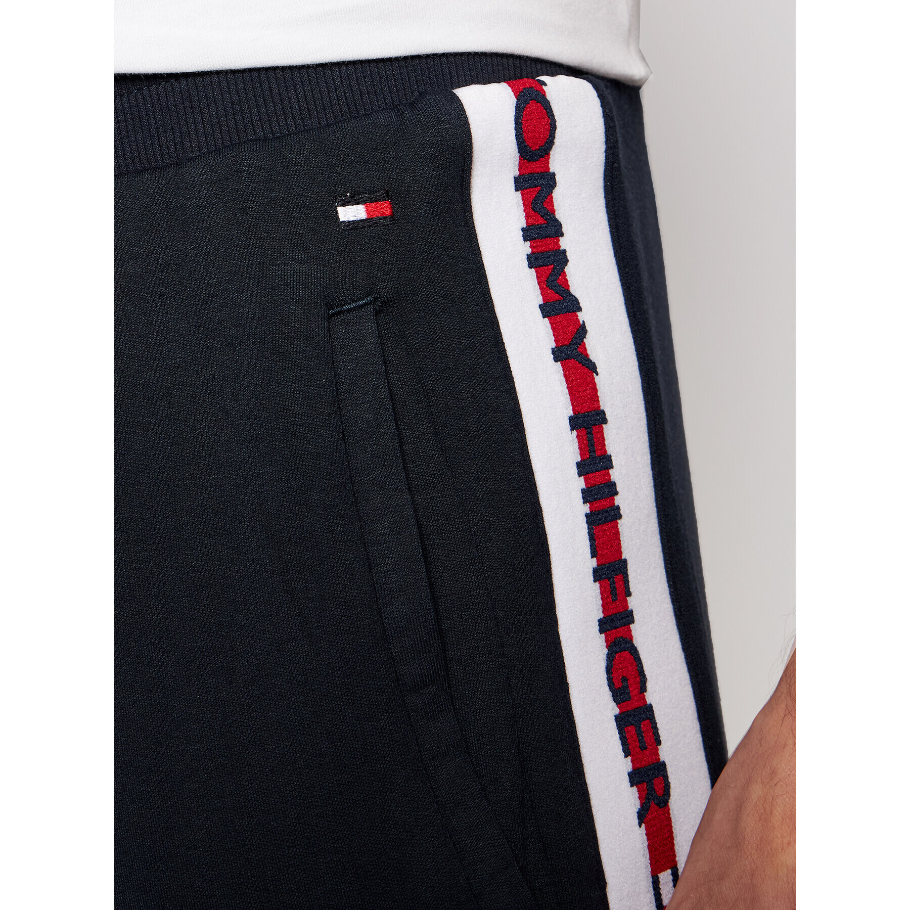 Tommy Hilfiger Pantaloni trening Repeat Logo UM0UM01918 Bleumarin Regular Fit - Pled.ro