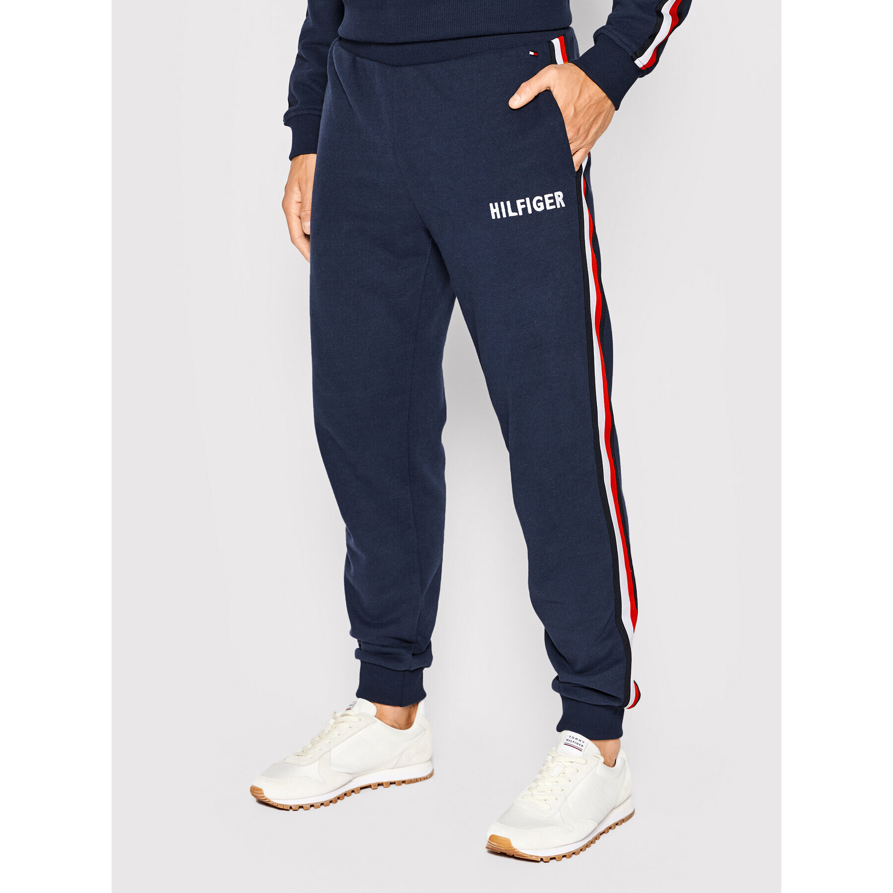 Tommy Hilfiger Pantaloni trening UM0UM02441 Bleumarin Regular Fit - Pled.ro