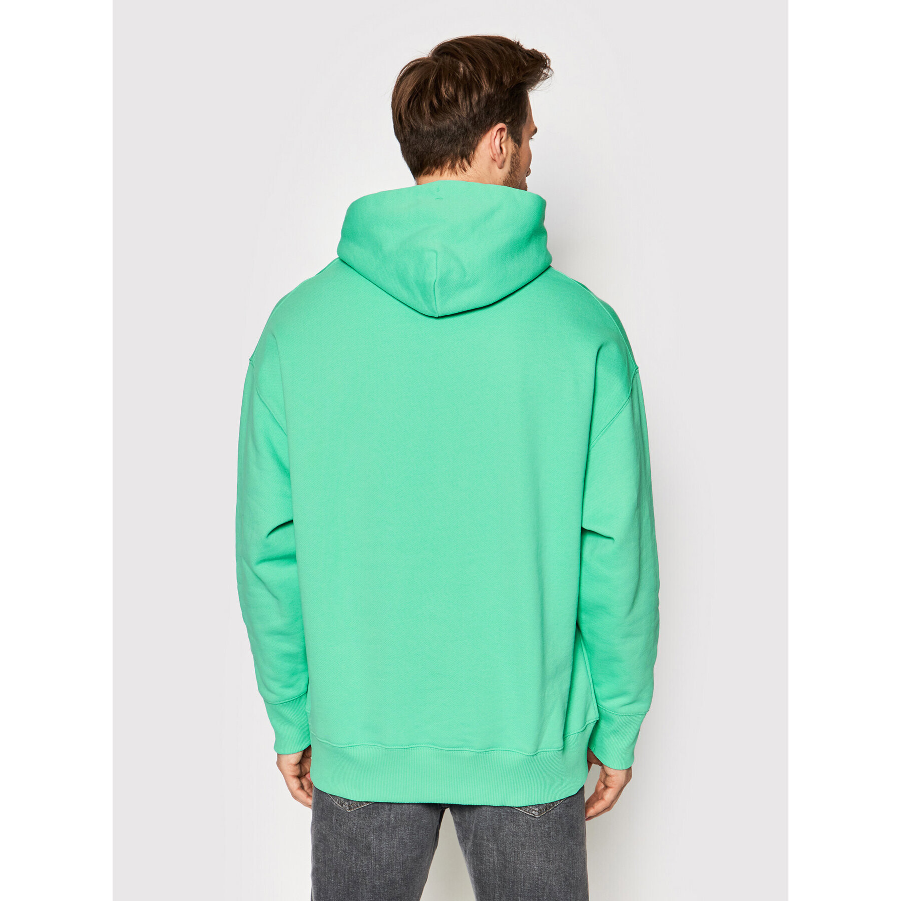 Tommy Jeans Bluză Badge DM0DM10904 Verde Regular Fit - Pled.ro